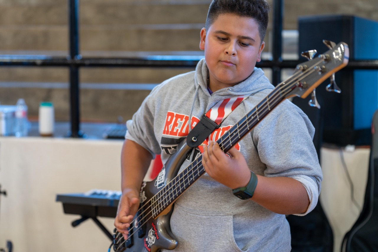 student playing guitar