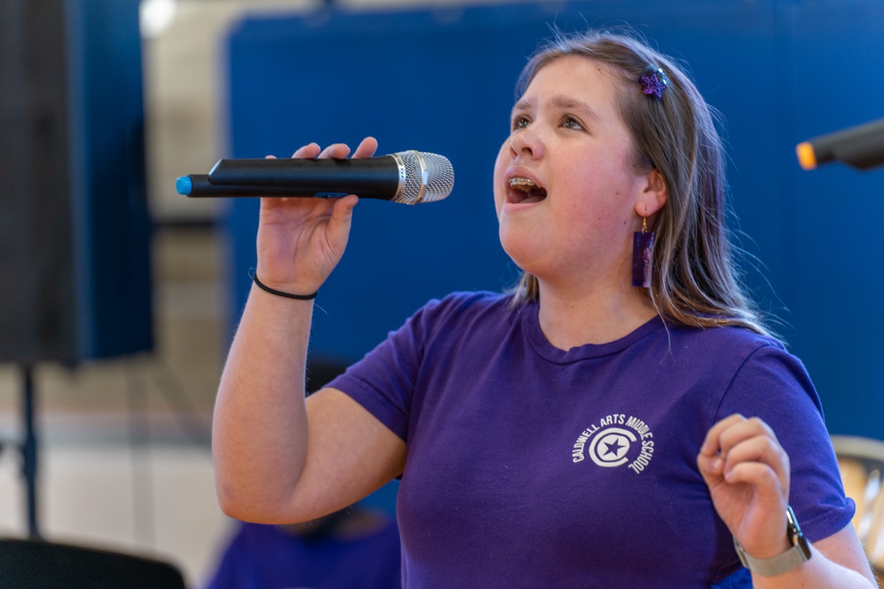 student singing