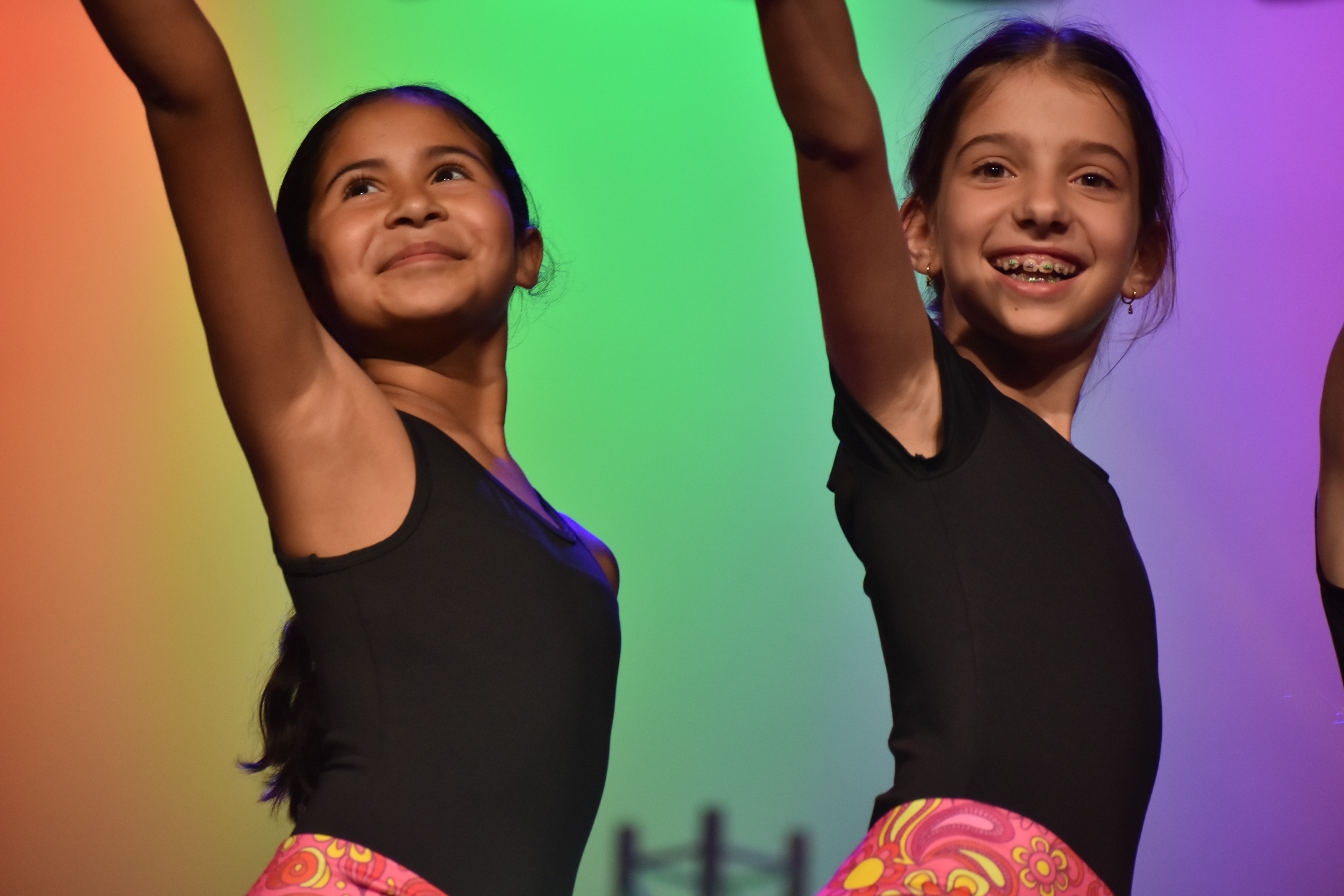 2 elementary girls in a performance