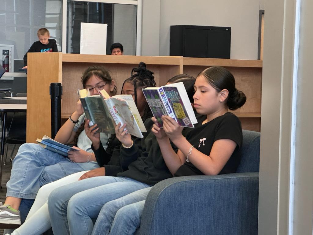 students in library