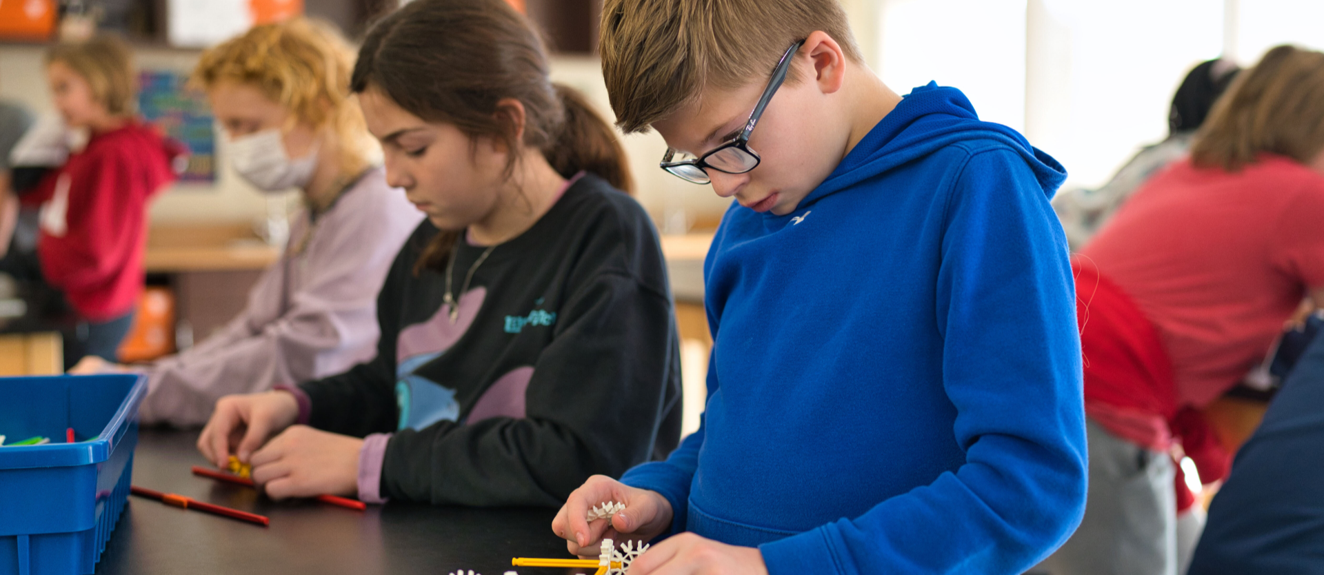 students working on stem activity in lab