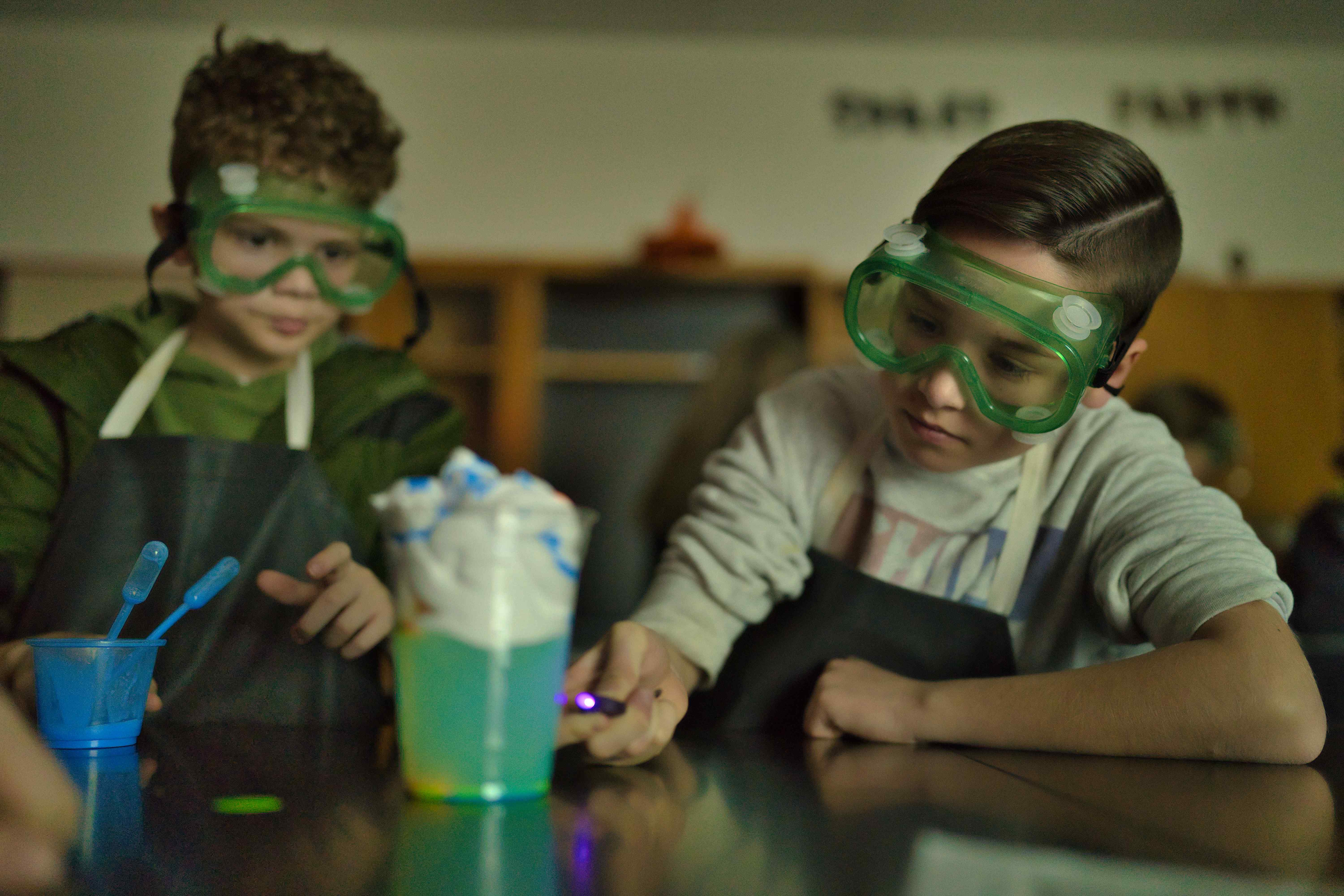 student working on science experiment 