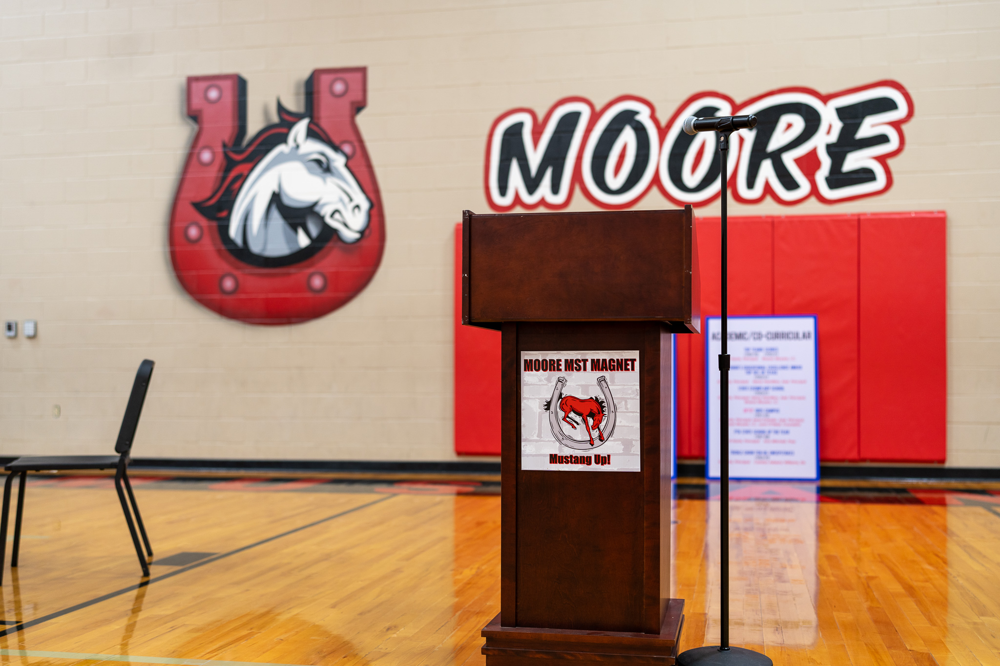 empty moore gym with mic