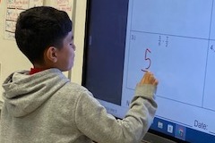 Summer Programs Students doing math problem