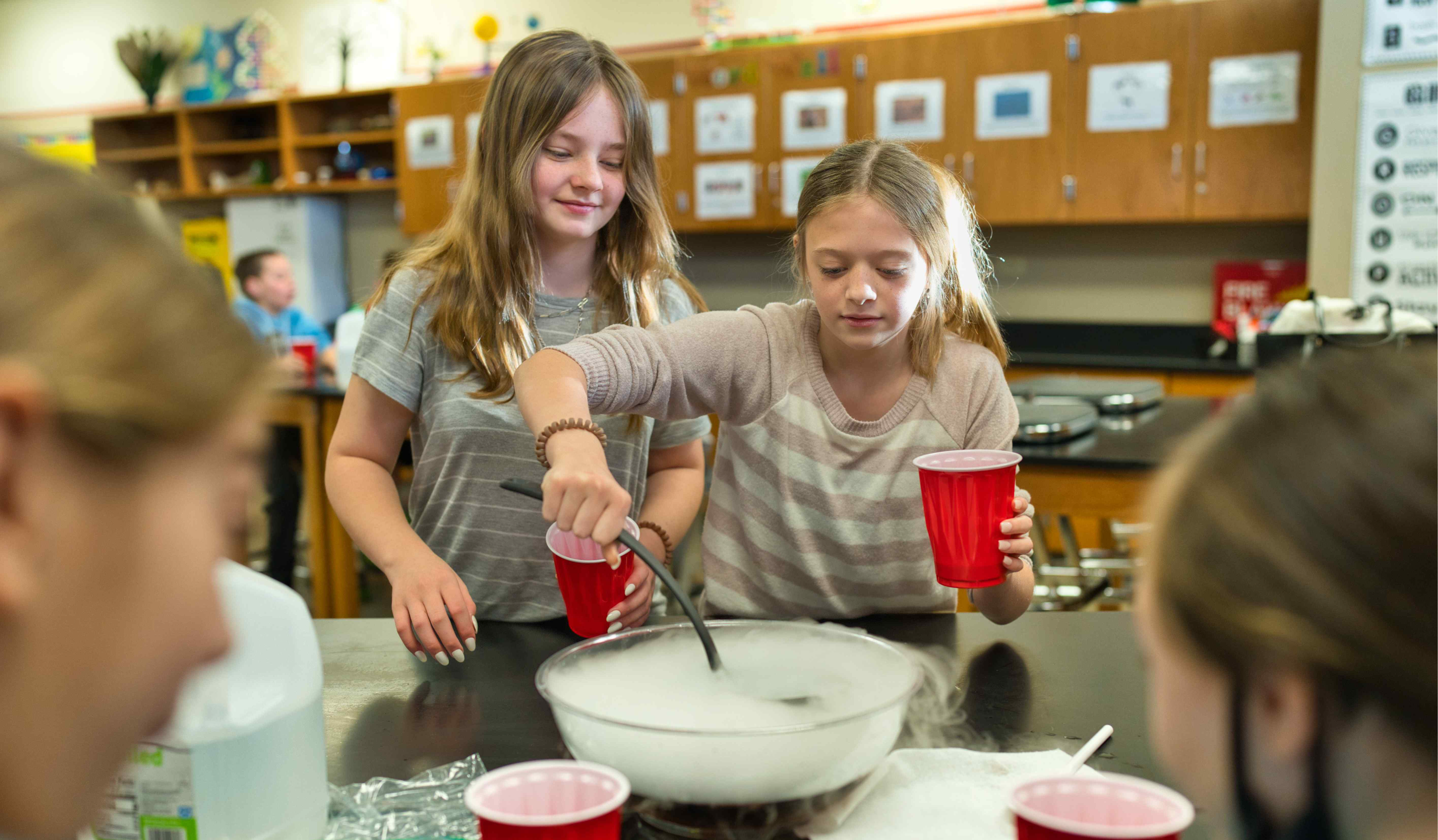 students working on science lab