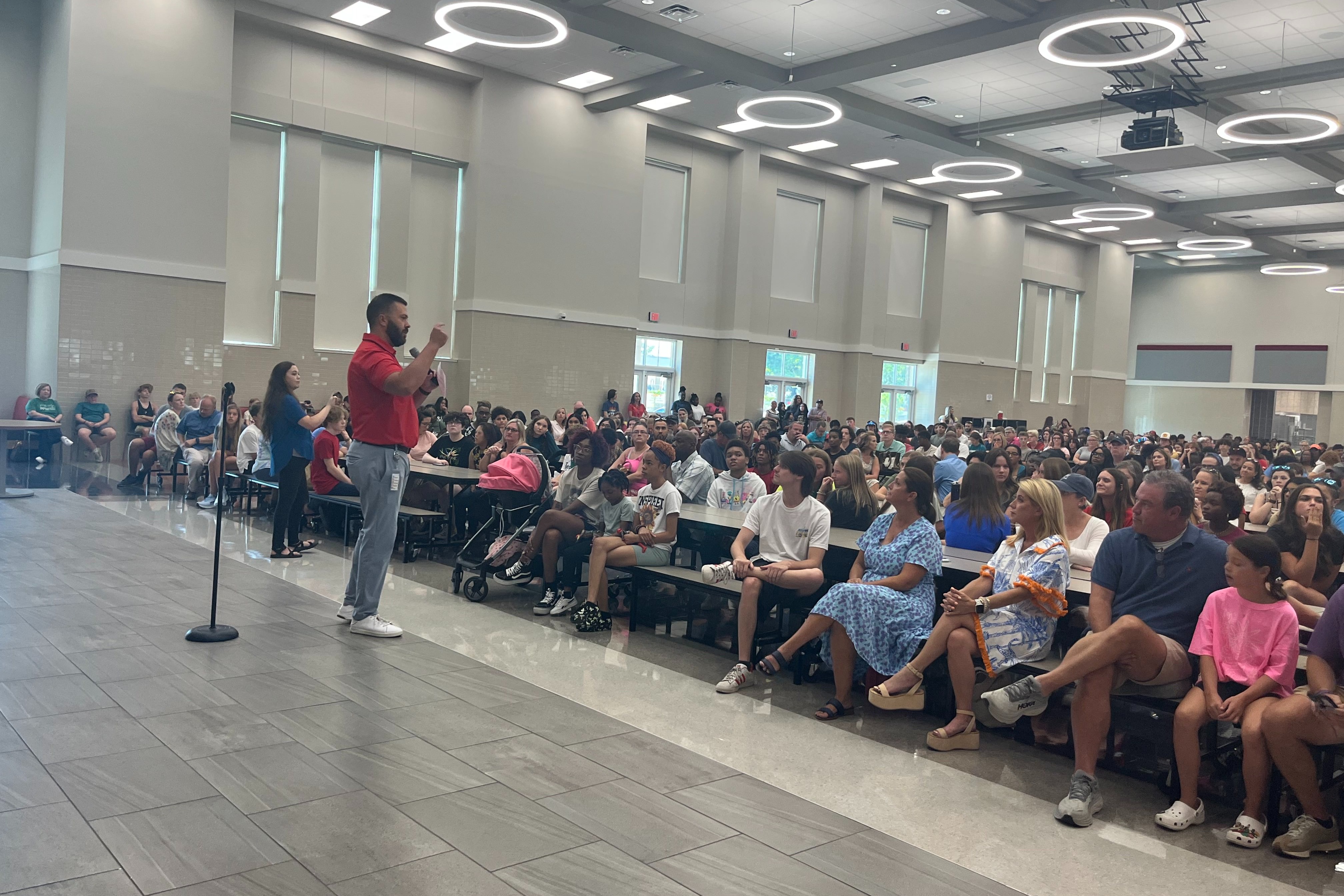 Mr. Sherman talking to parents and students at Fish Camp