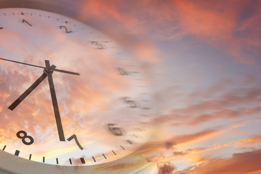 clock face with cloud background