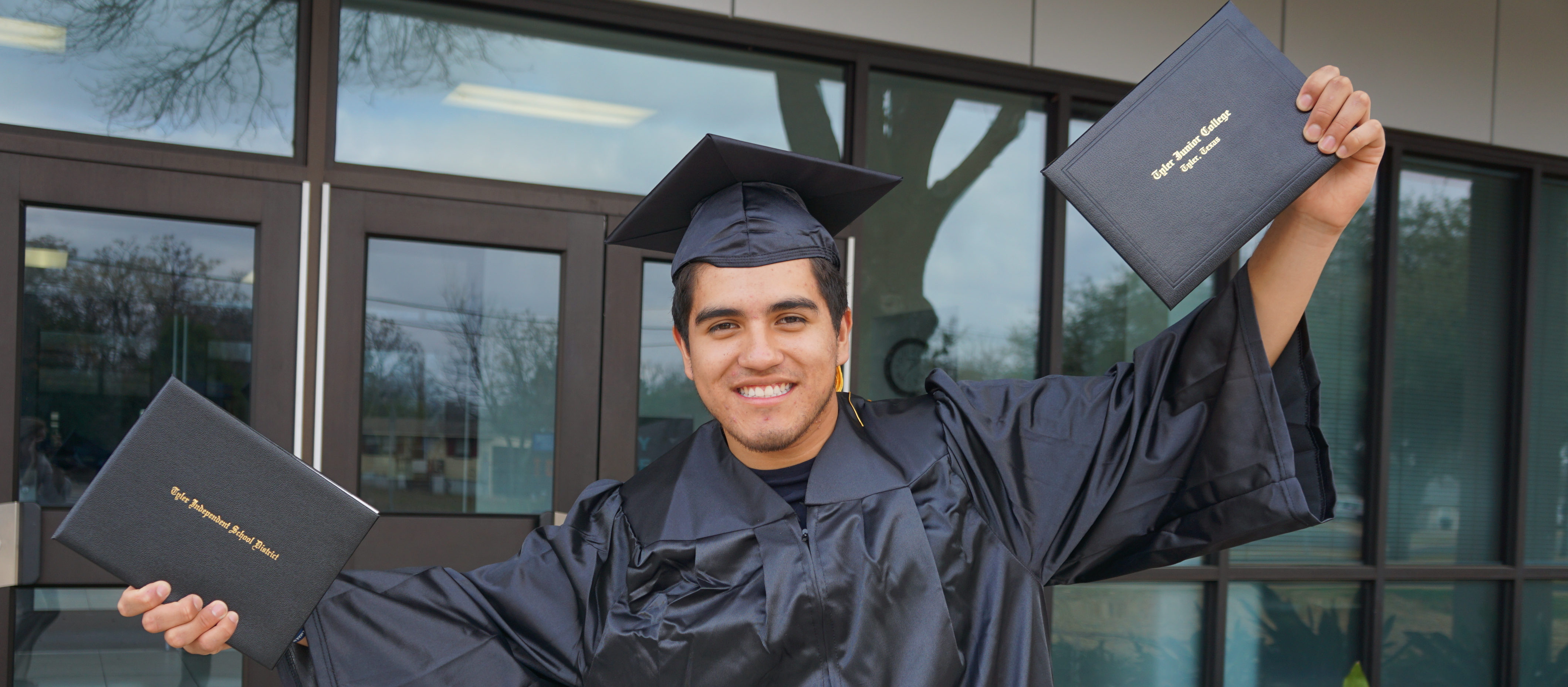 graduation student with a degree and diploma