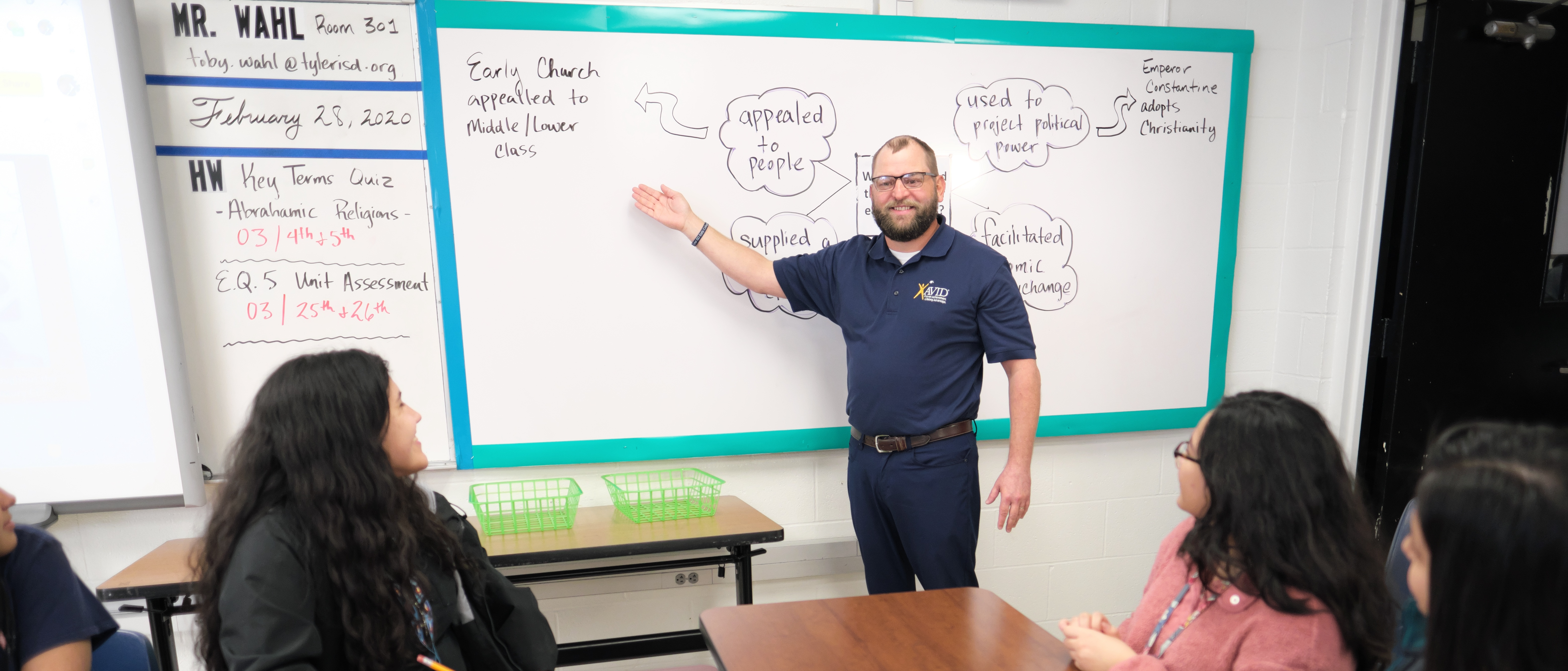 teacher teaching in classroom