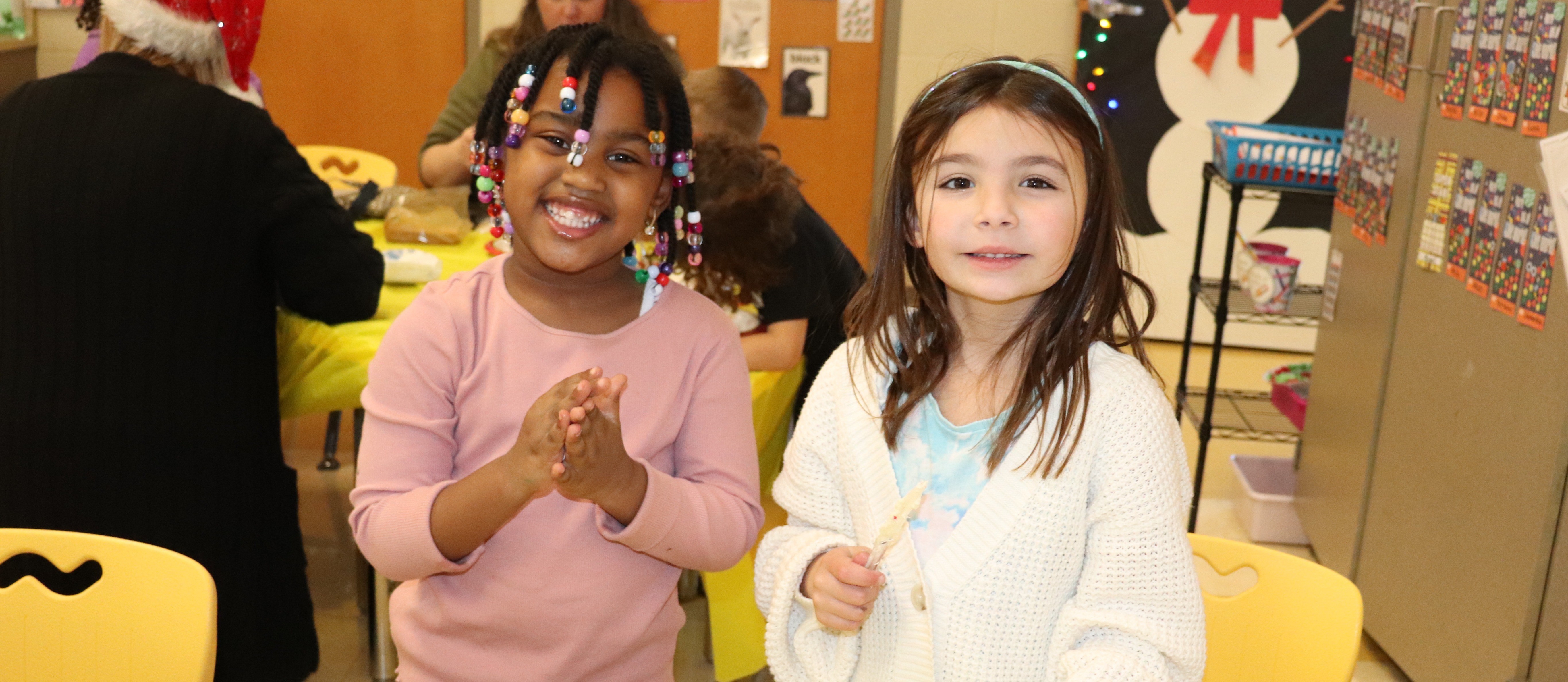 Two students smiling 