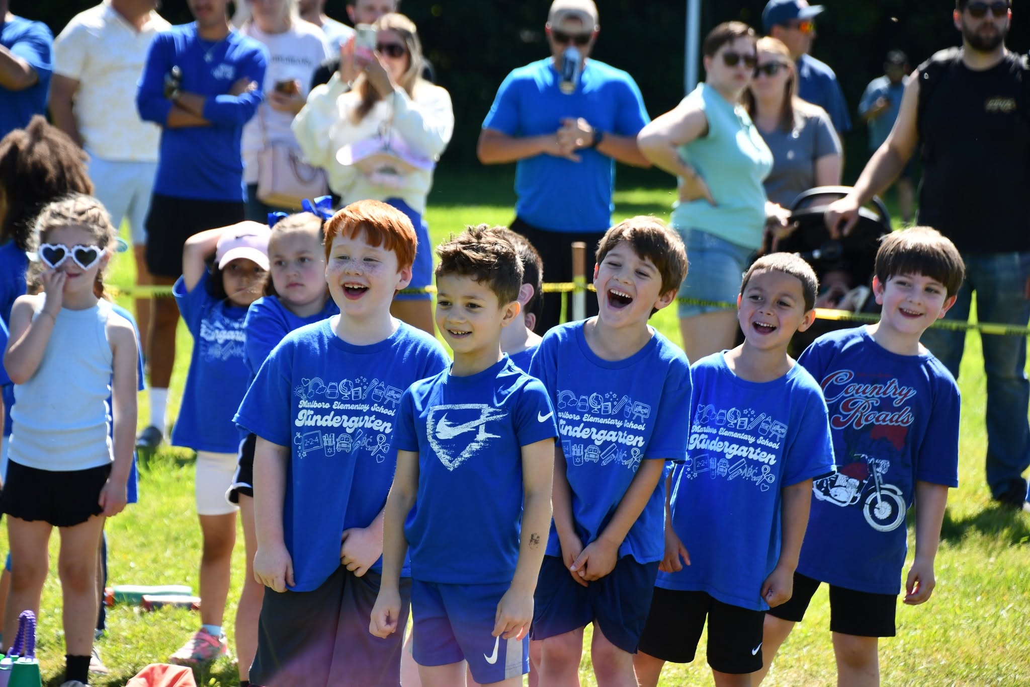 boys laughing at field day