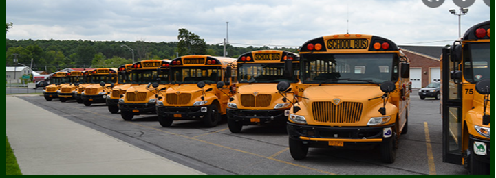 NACS School Buses on the outside of the Elementary Building where the buses park 