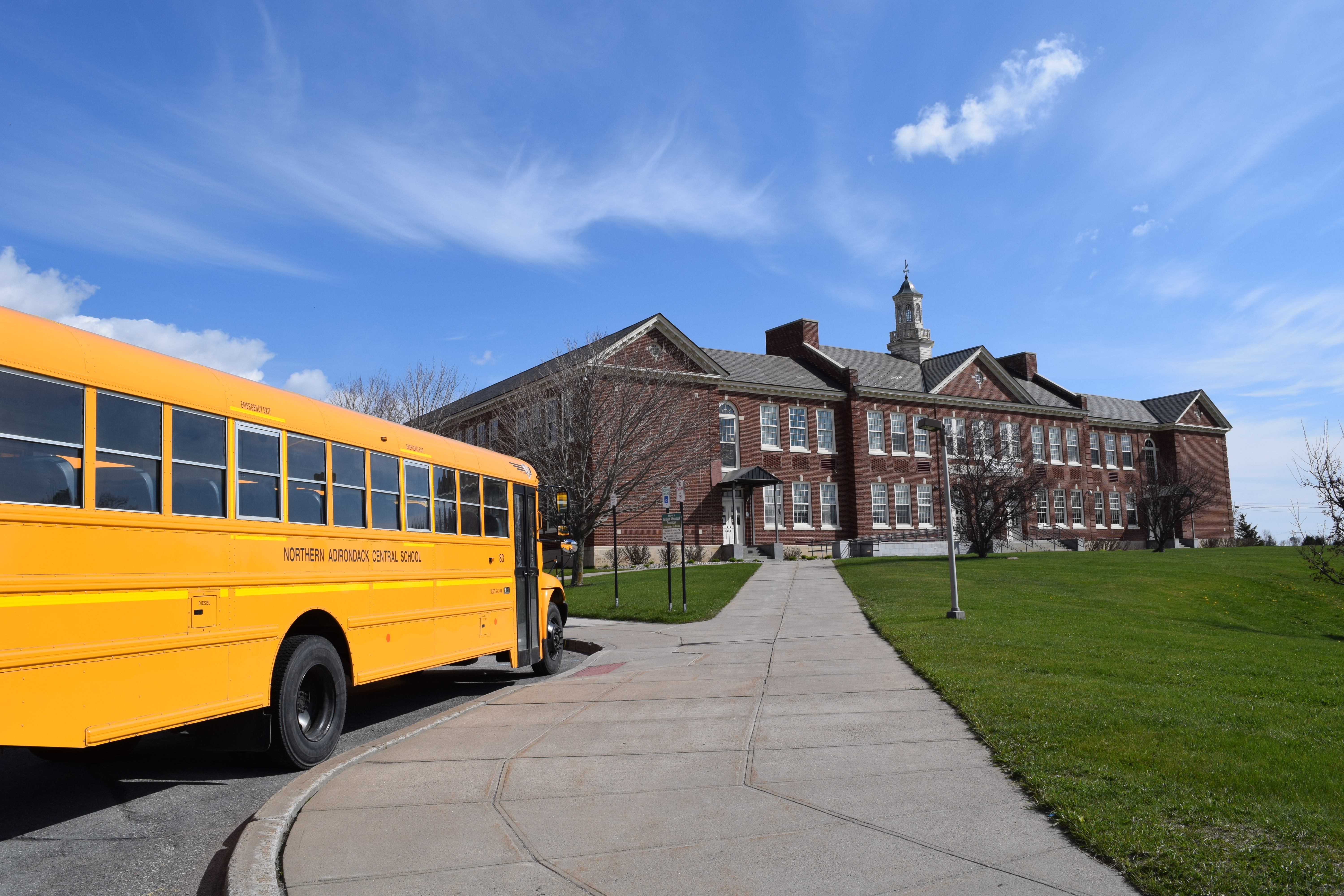 NACSD bus in front of school building