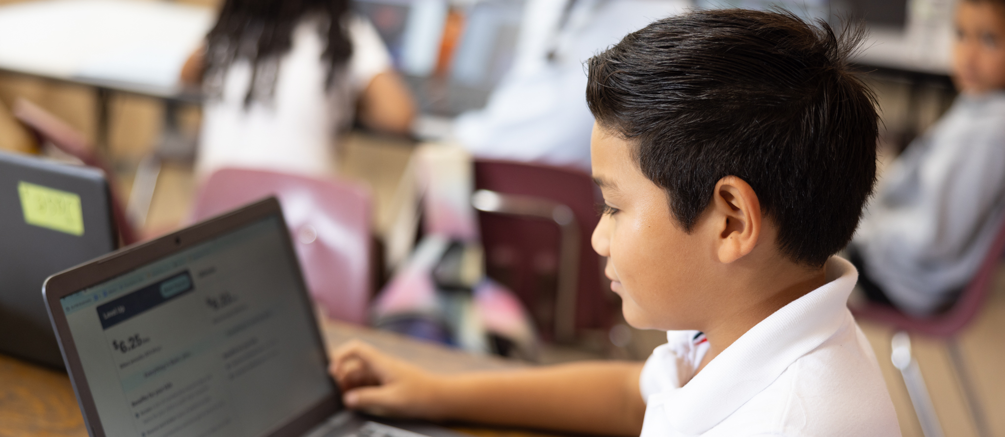 student working at laptop