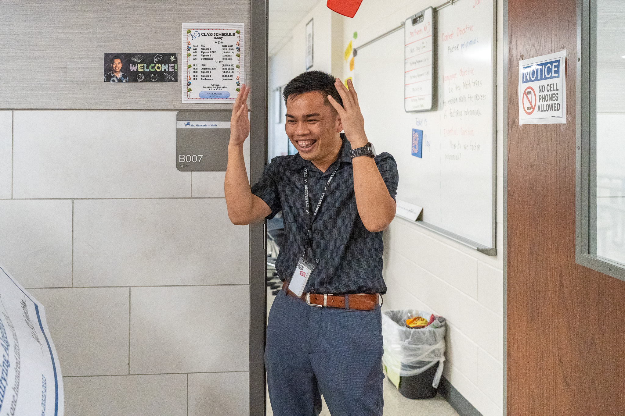 man getting surprised with a giant check for a grant