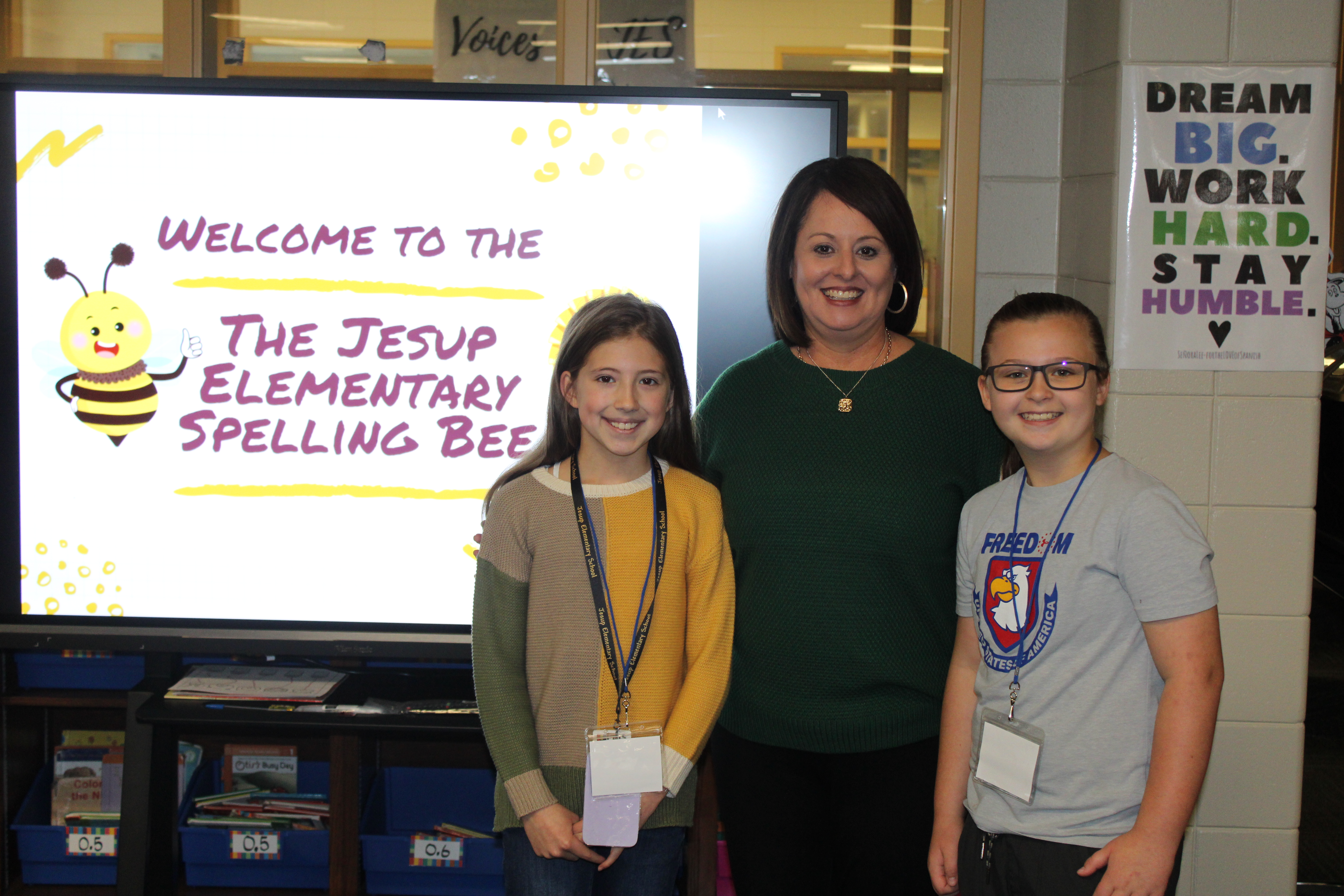 Principal Ogden with spelling bee winner and alternate
