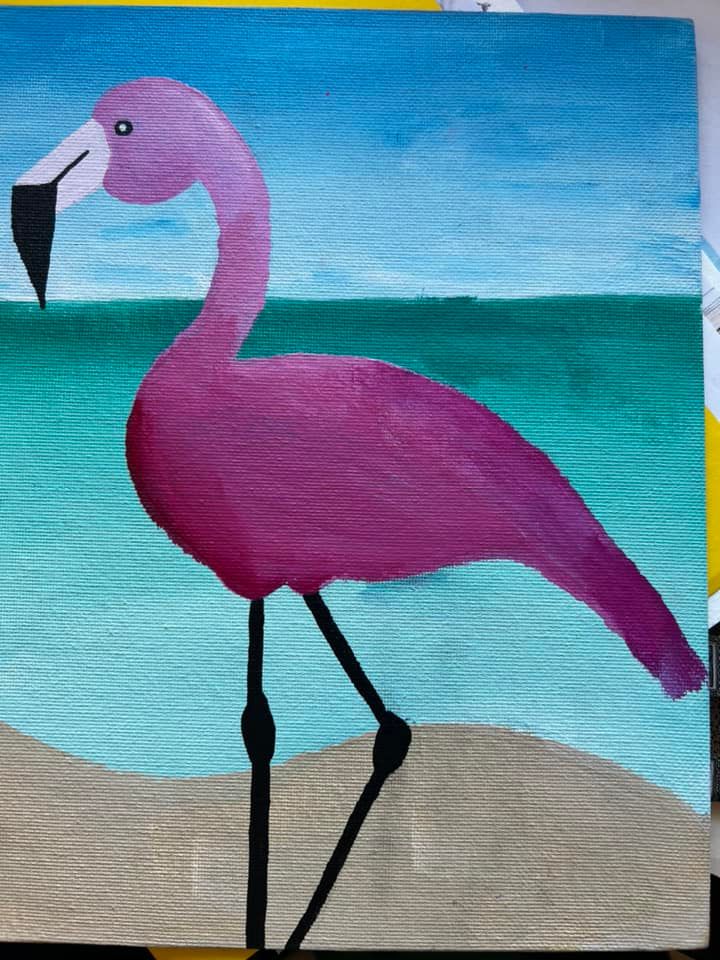 Coler drawing of Flamingo with blue water background