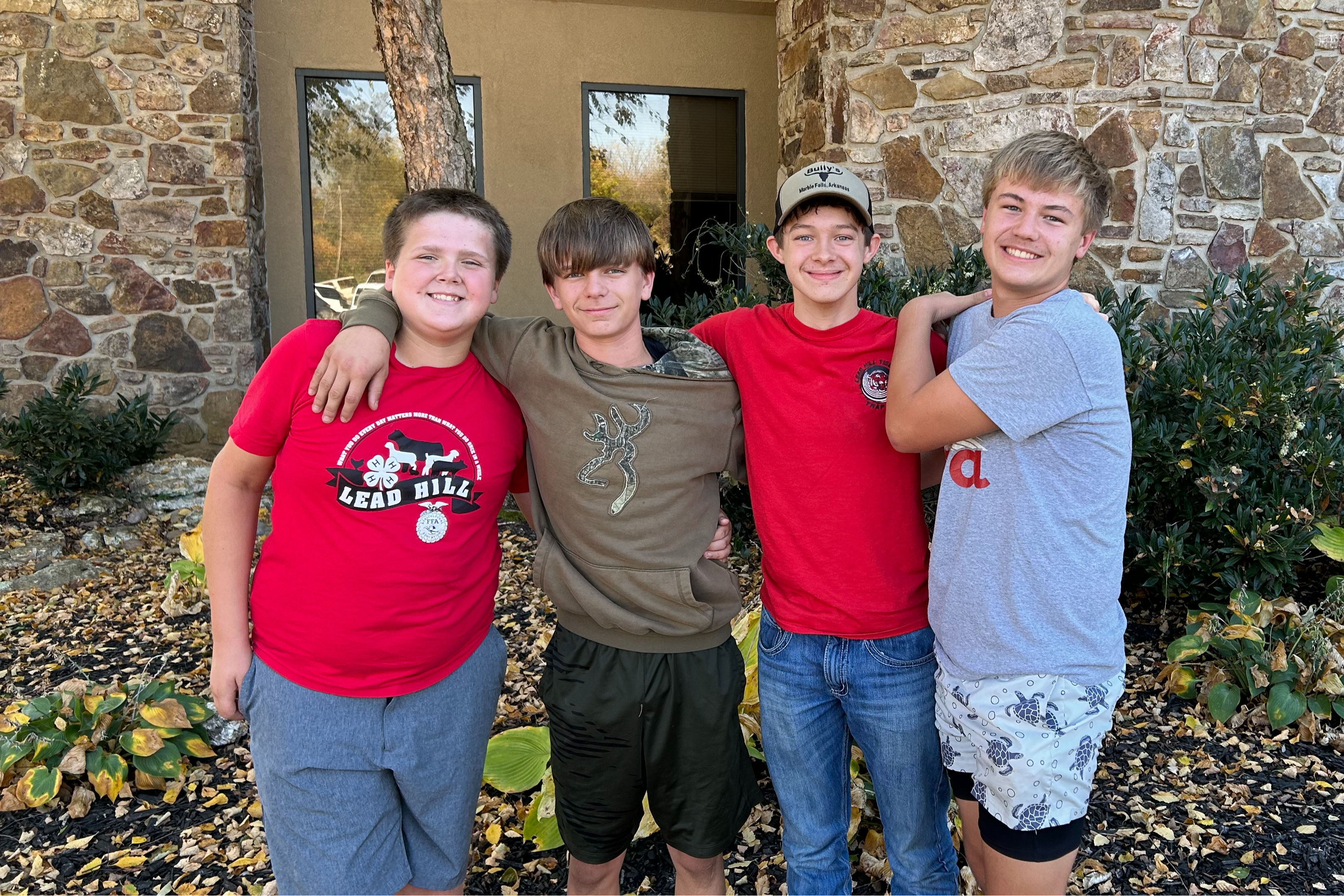 Group of students smiling together at Chess Tournament