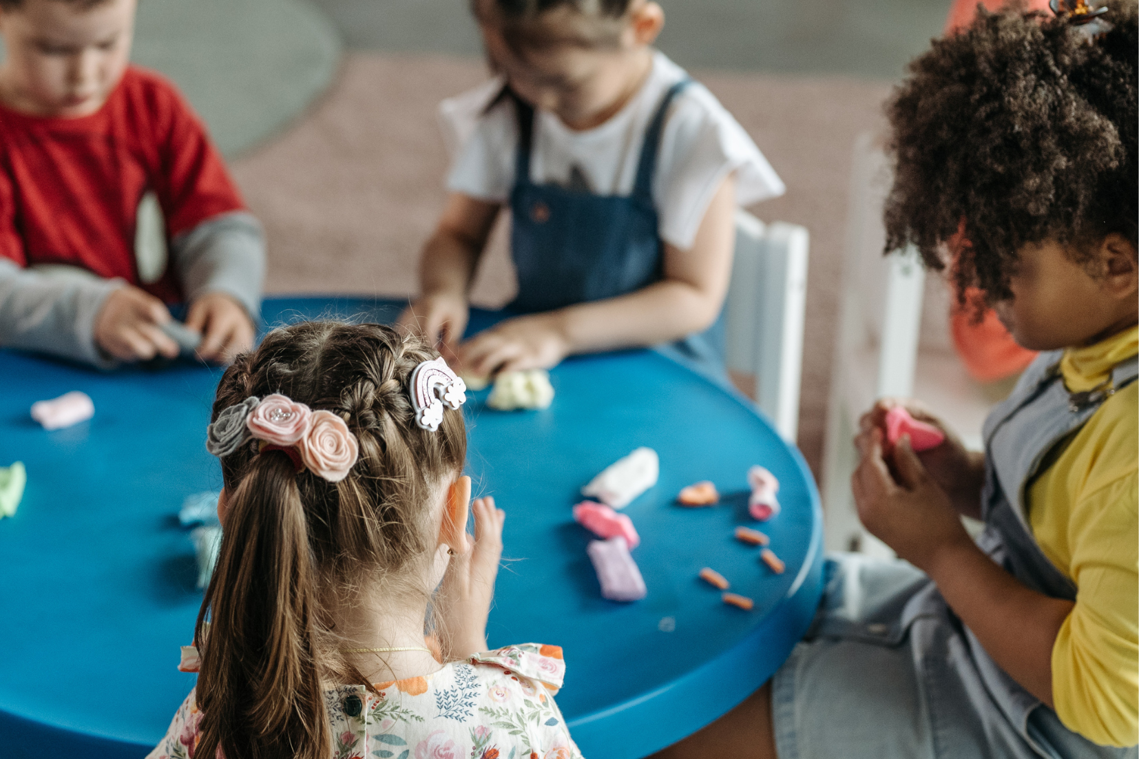 kindergarten age students play with dough
