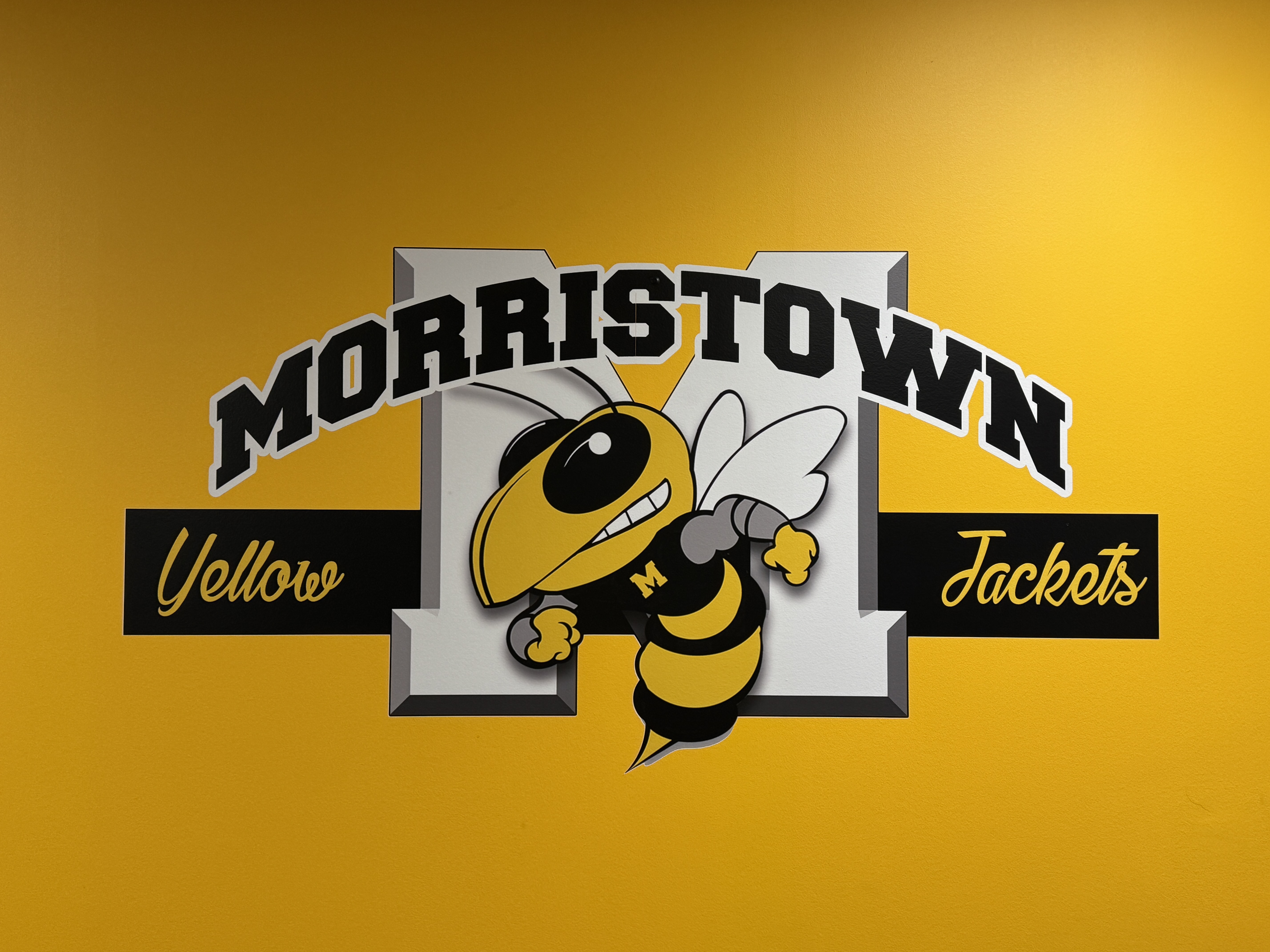 Morristown Yellow Jackets logo on wall