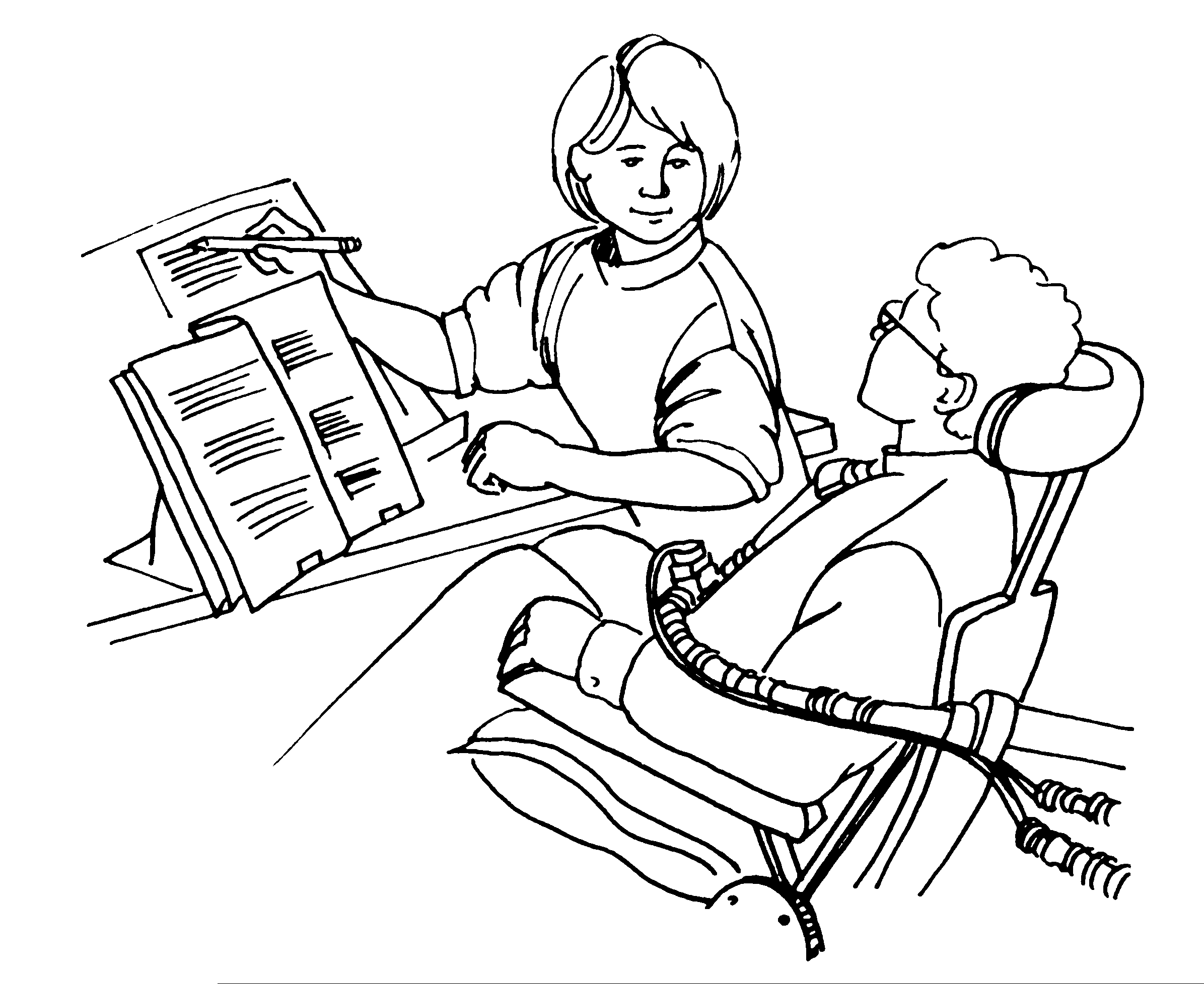image of an adult helping a student in a wheelchair with an assignment
