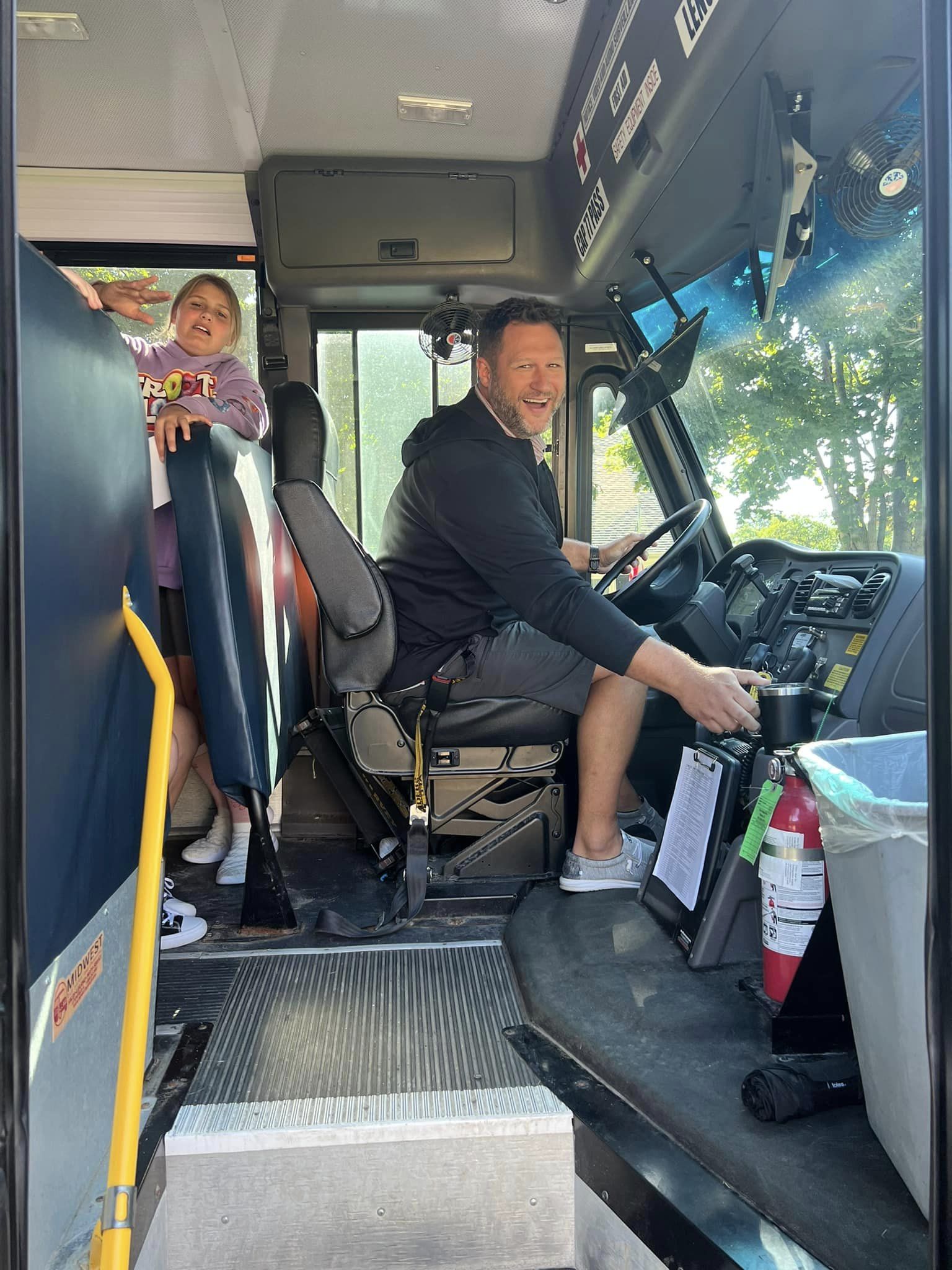 Bus driver smiling 