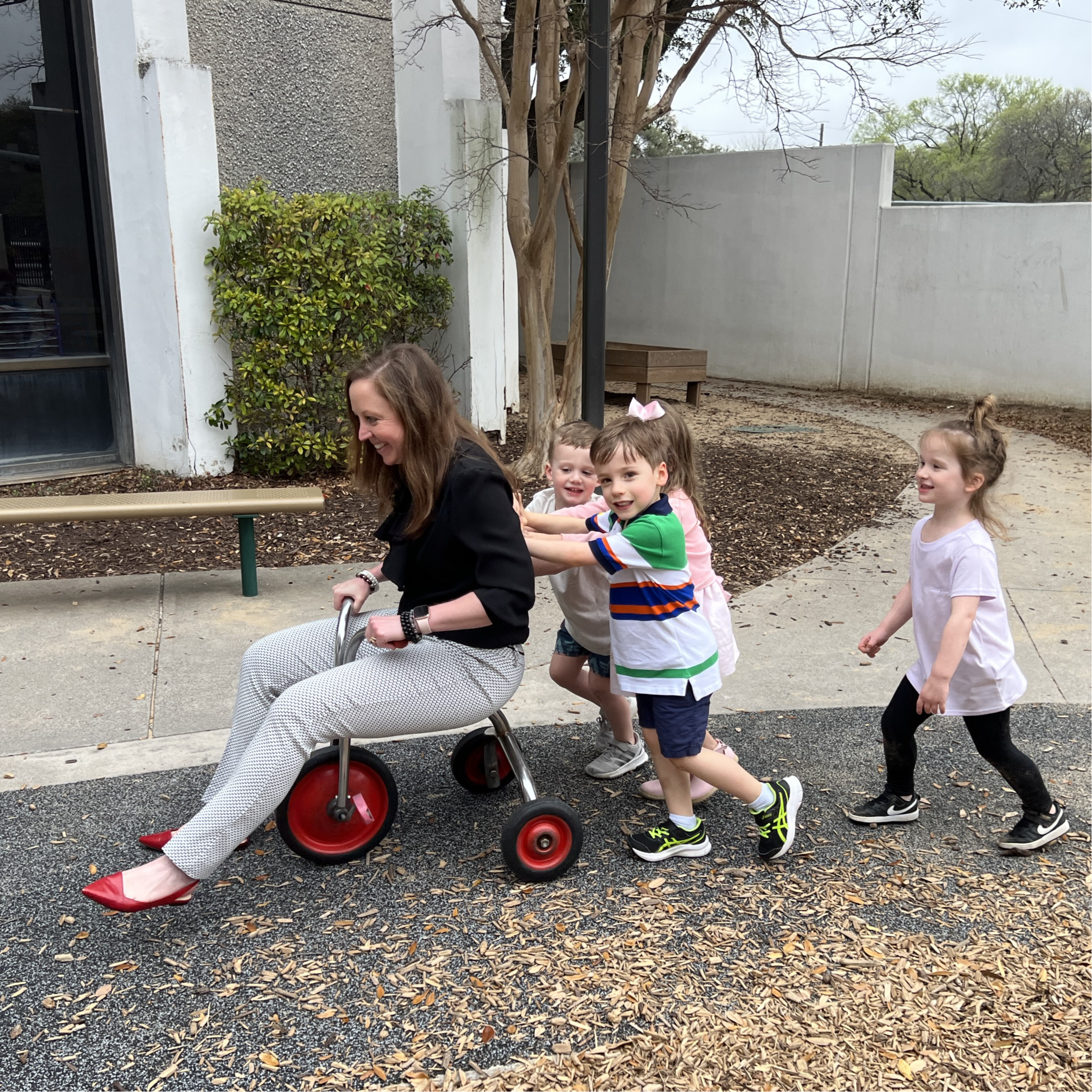 Meg Fahrenbrook on playground with preschoolers