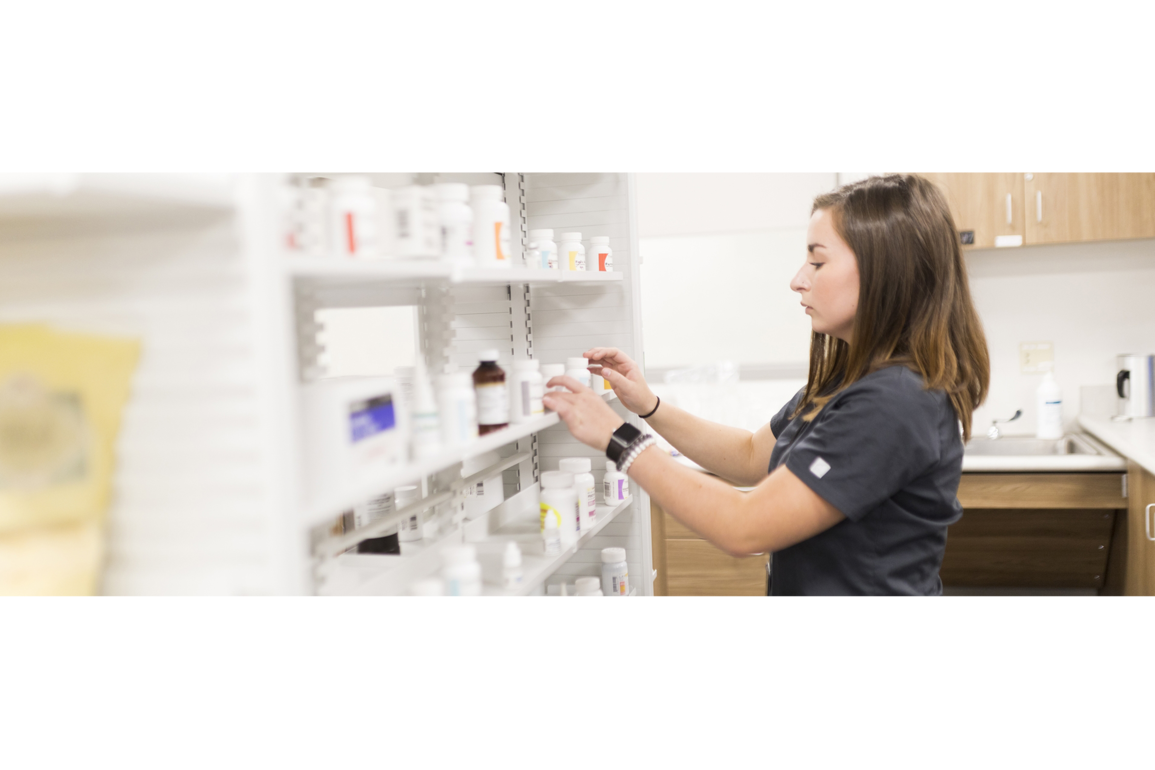 Pharmacy Technician reviewing label