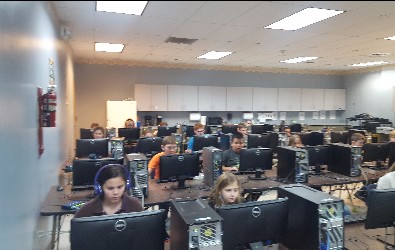 This class is coding (writing) their own computer game!