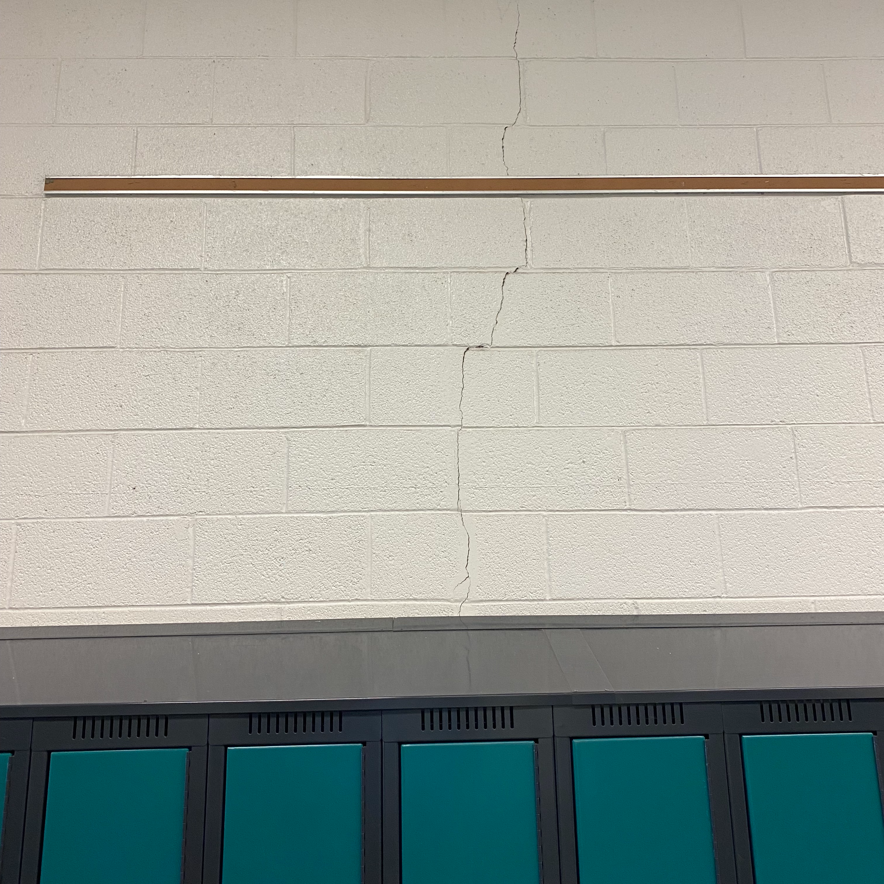 Cracked Wall by Lockers