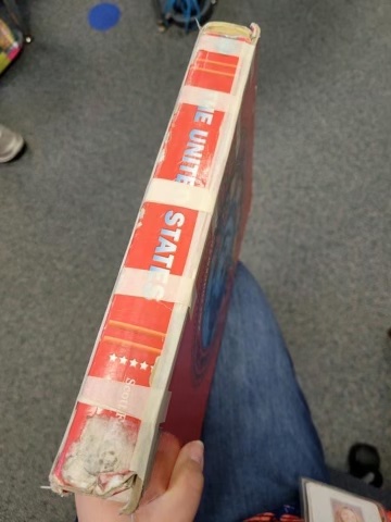 Taped together textbook spine