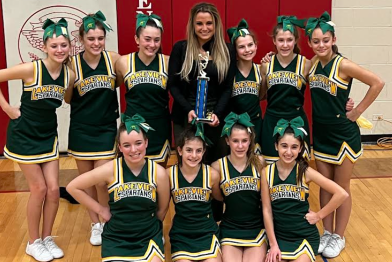 cheer team with trophy