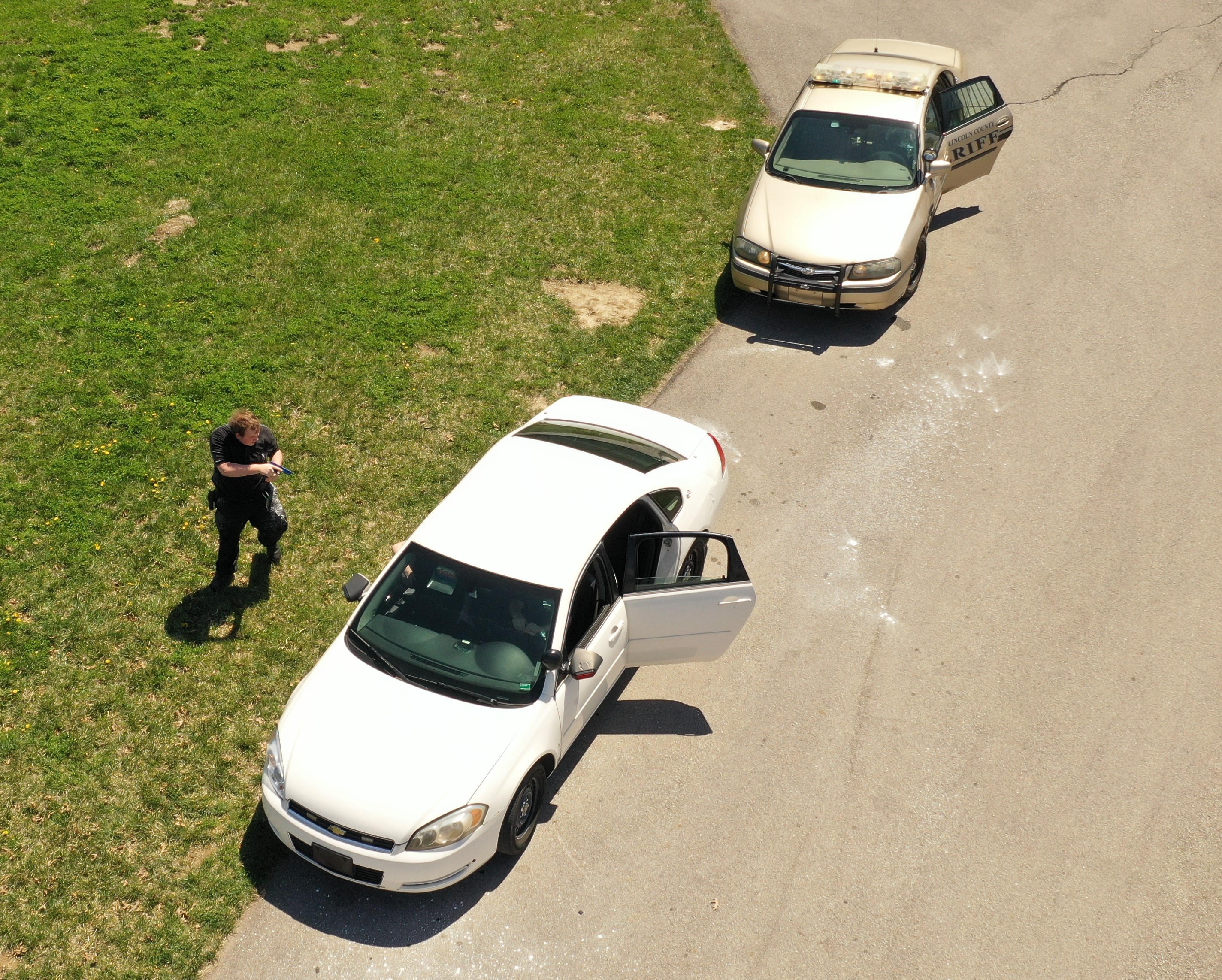 Aerial view of police car at a traffic stop