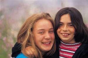 Two girls hugging