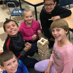students work together to build
