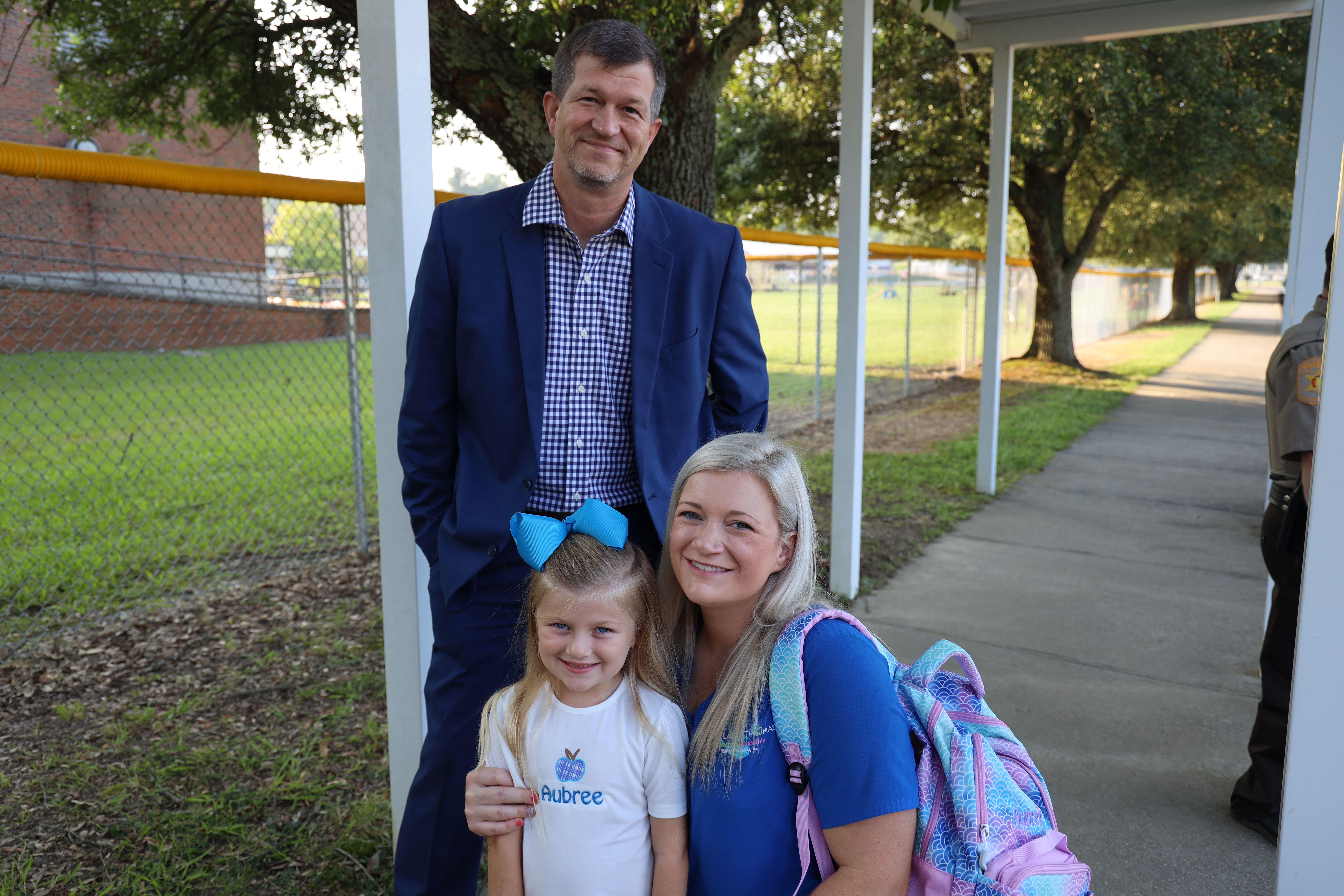 Dr Barnette with parent and student