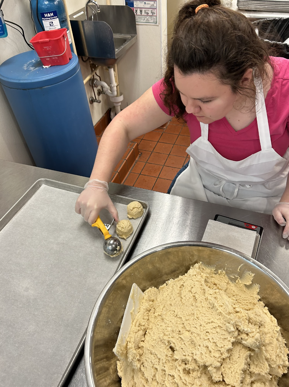 student working in bakery