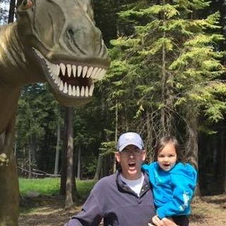 Being chased by a dinosaur.