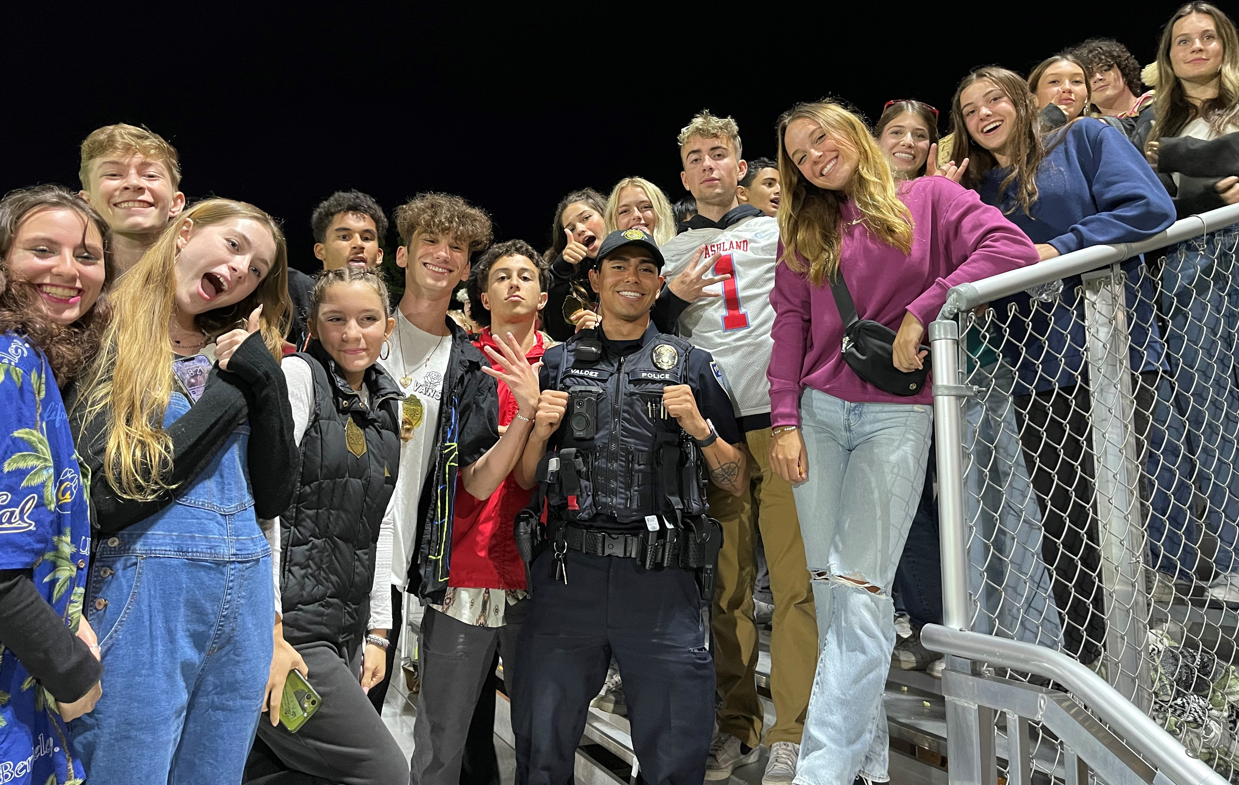 students with police officer 