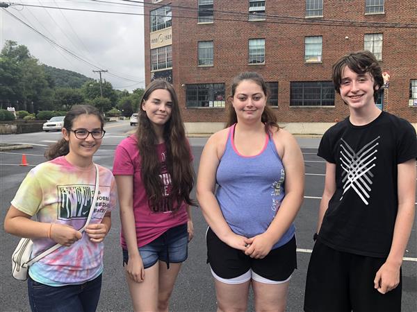 Small group of students standing outside