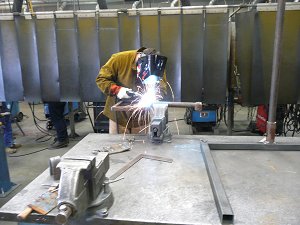 Adult student welding