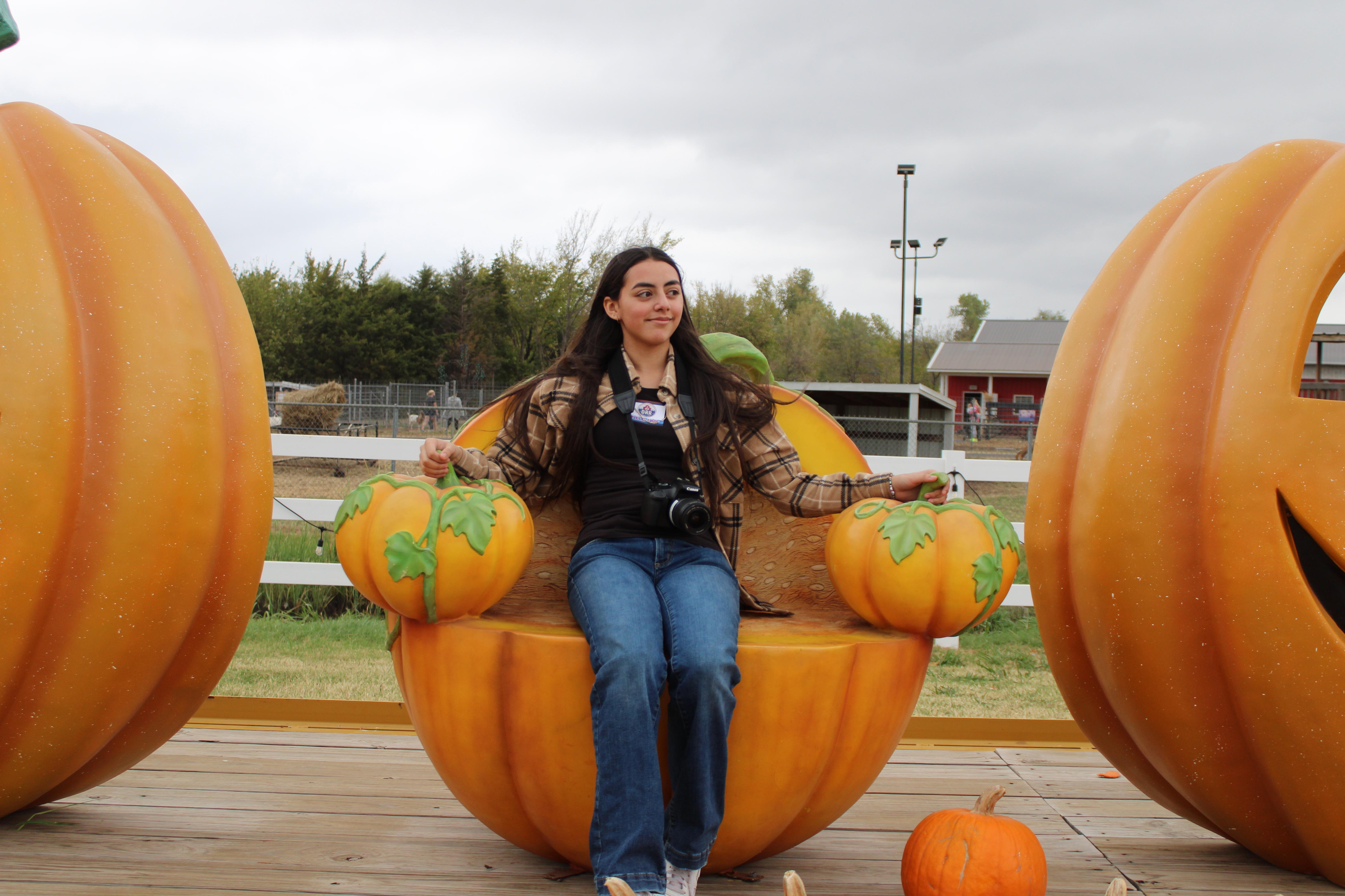 Journalism Staff member Sophomore Dalia Marquez coving the Elementary field trip to the pumpkin patch.