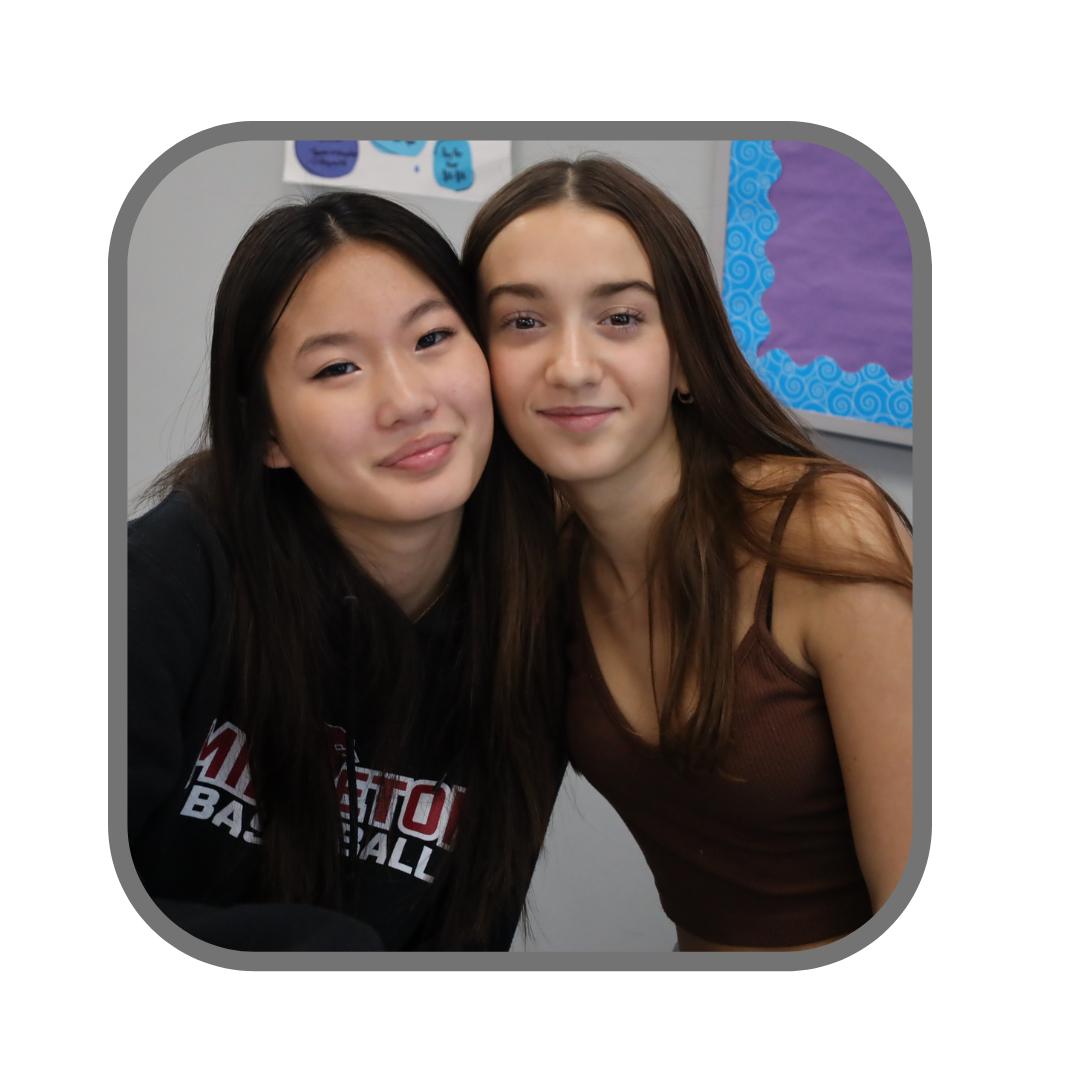 two female students smiling