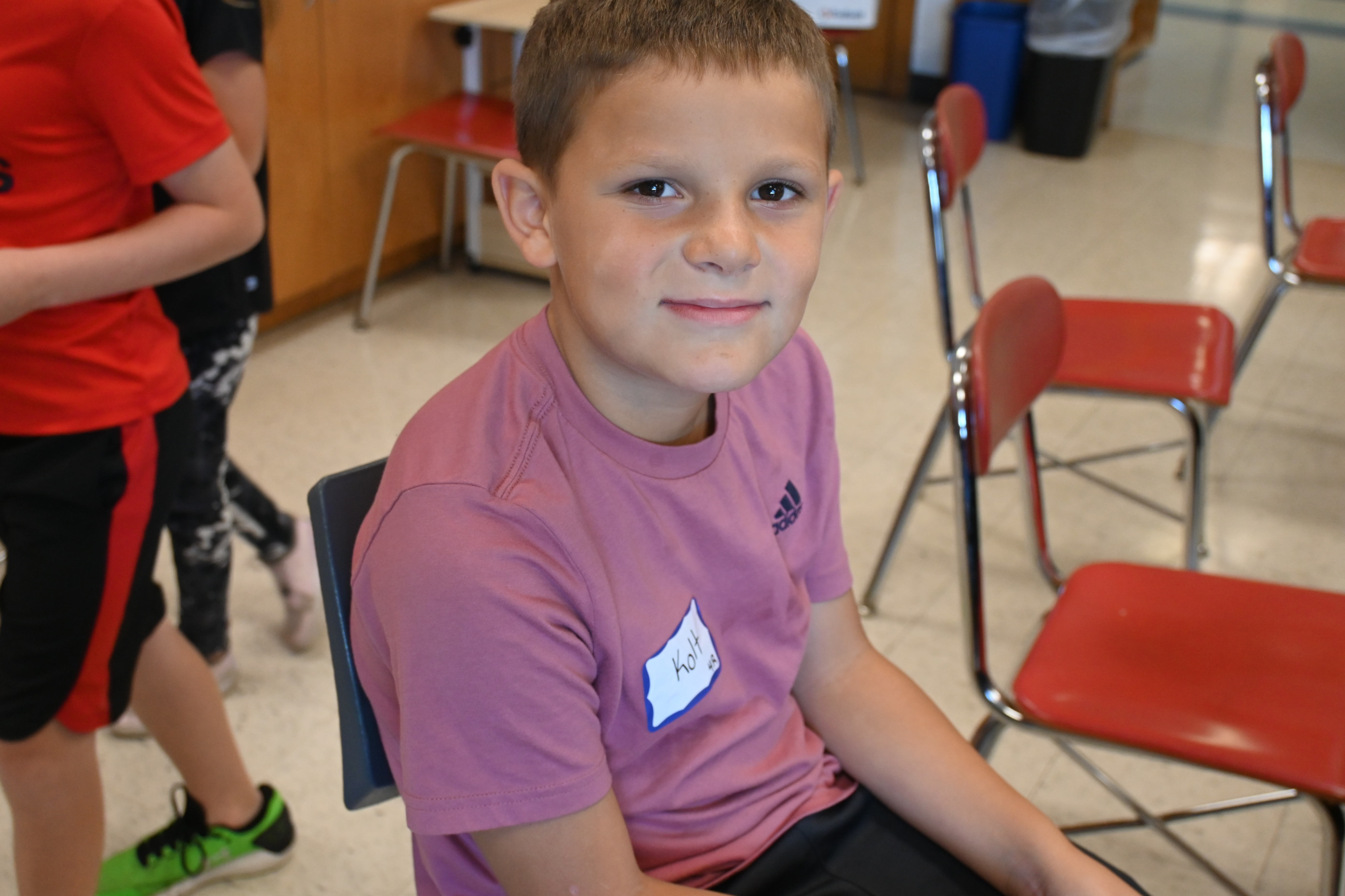 3rd grade boy in classroom
