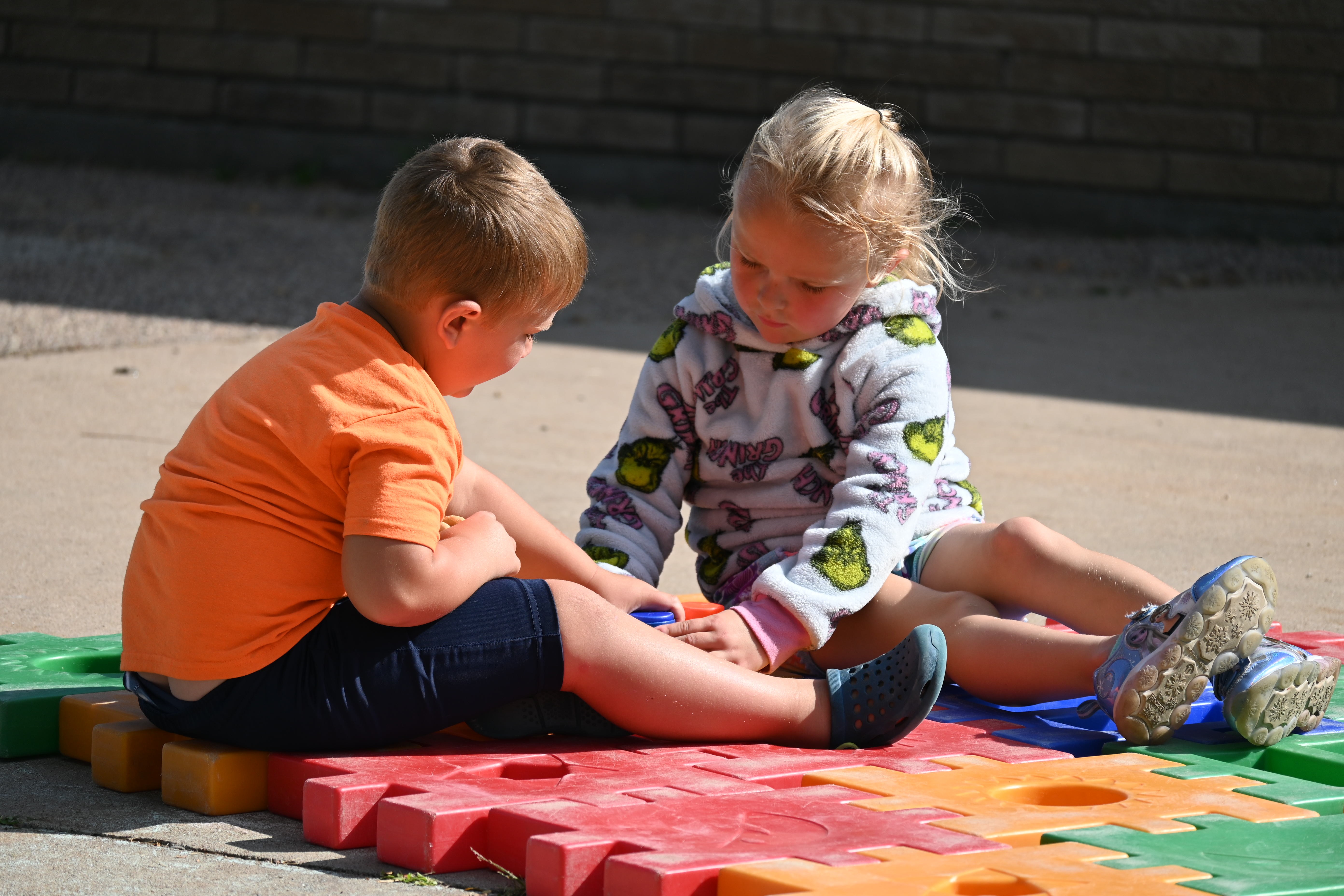 4K students playing outside.