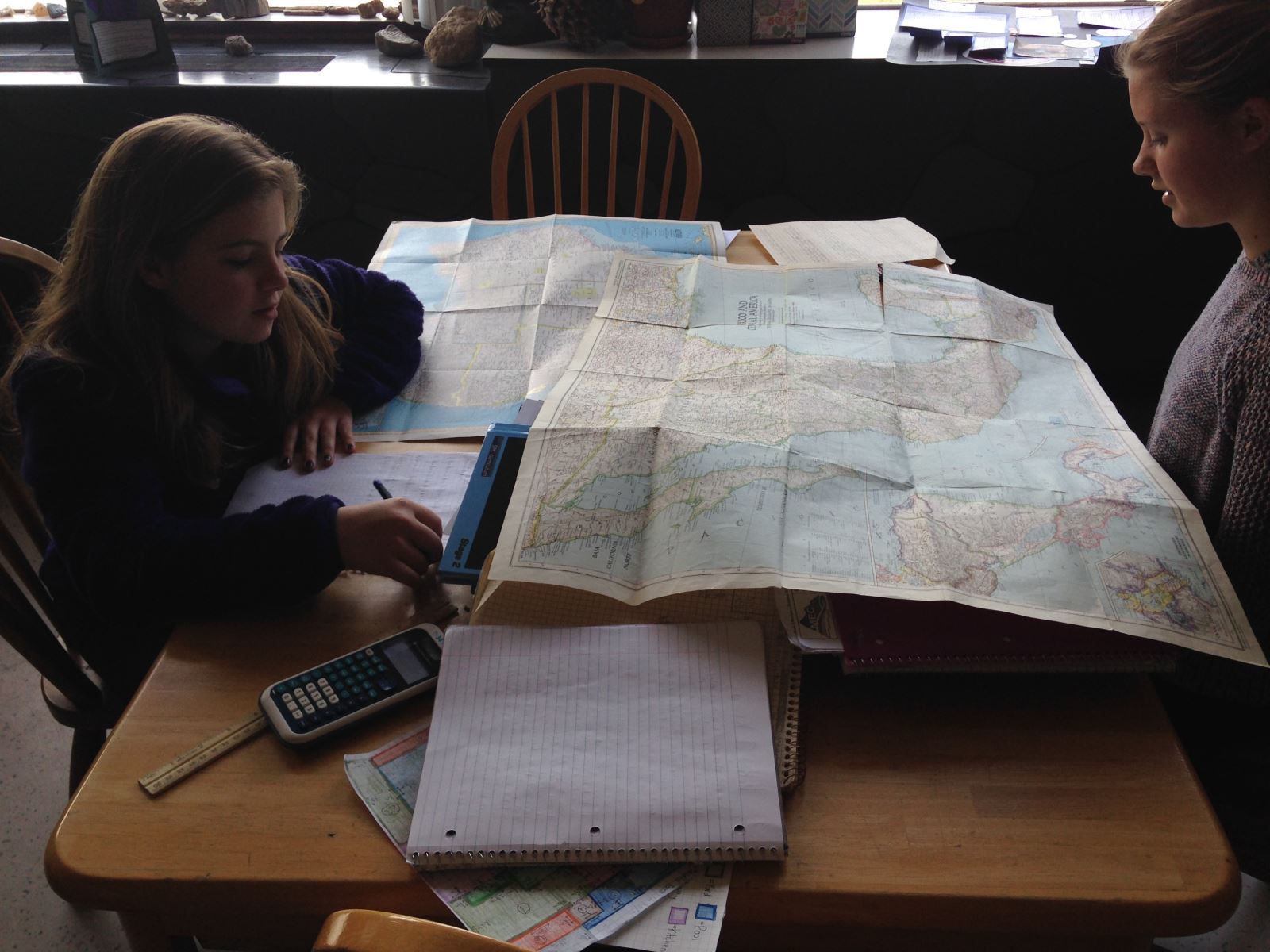 students reading a map