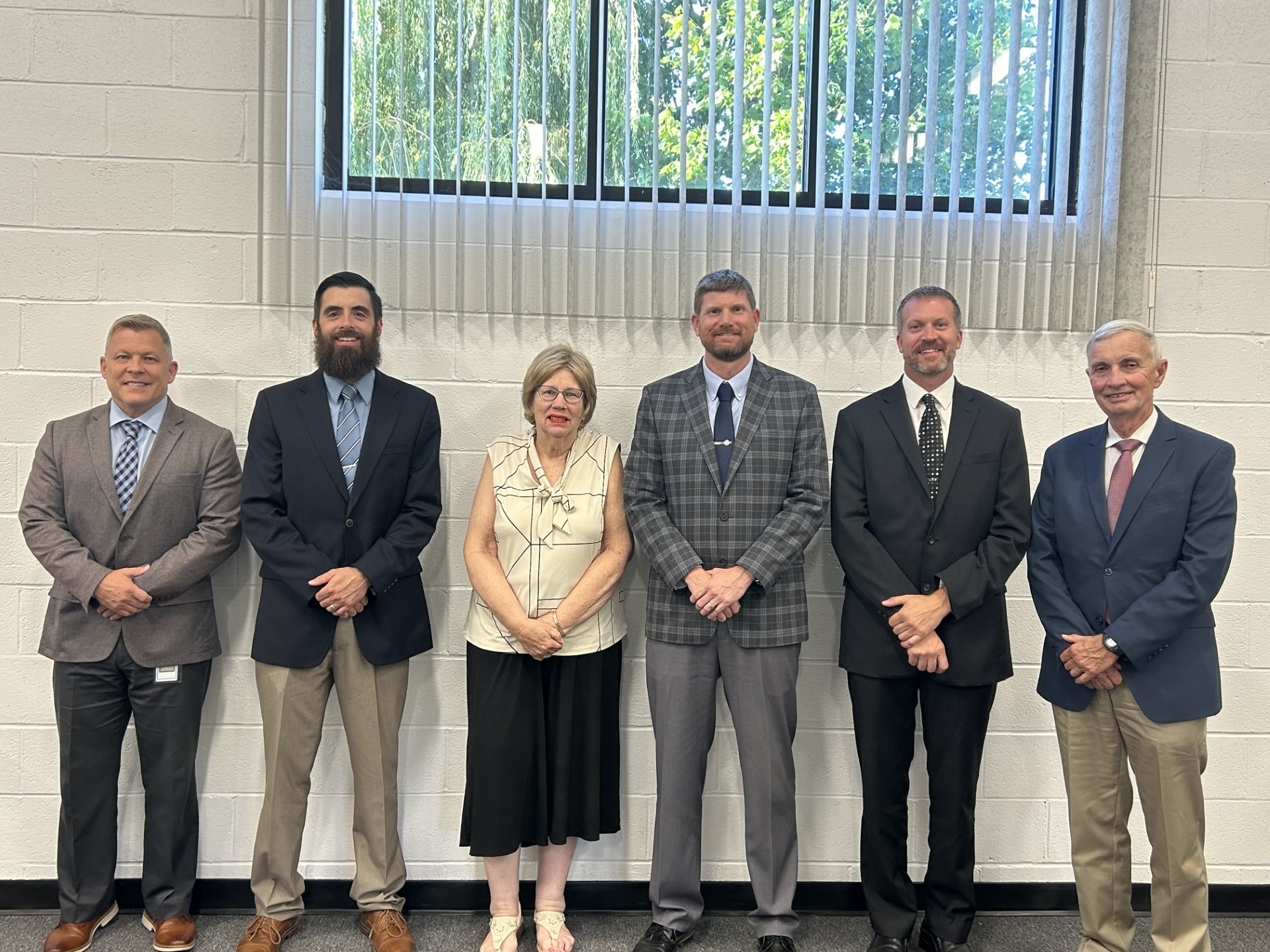 School Superintendent and board members, 5 men and 1 women.