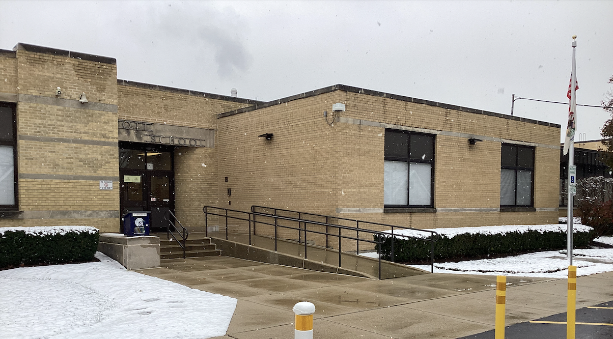 Front of Scott School, snowing outside