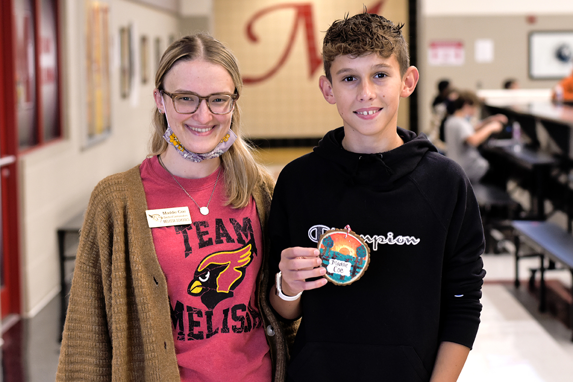 Maddie Coe with student