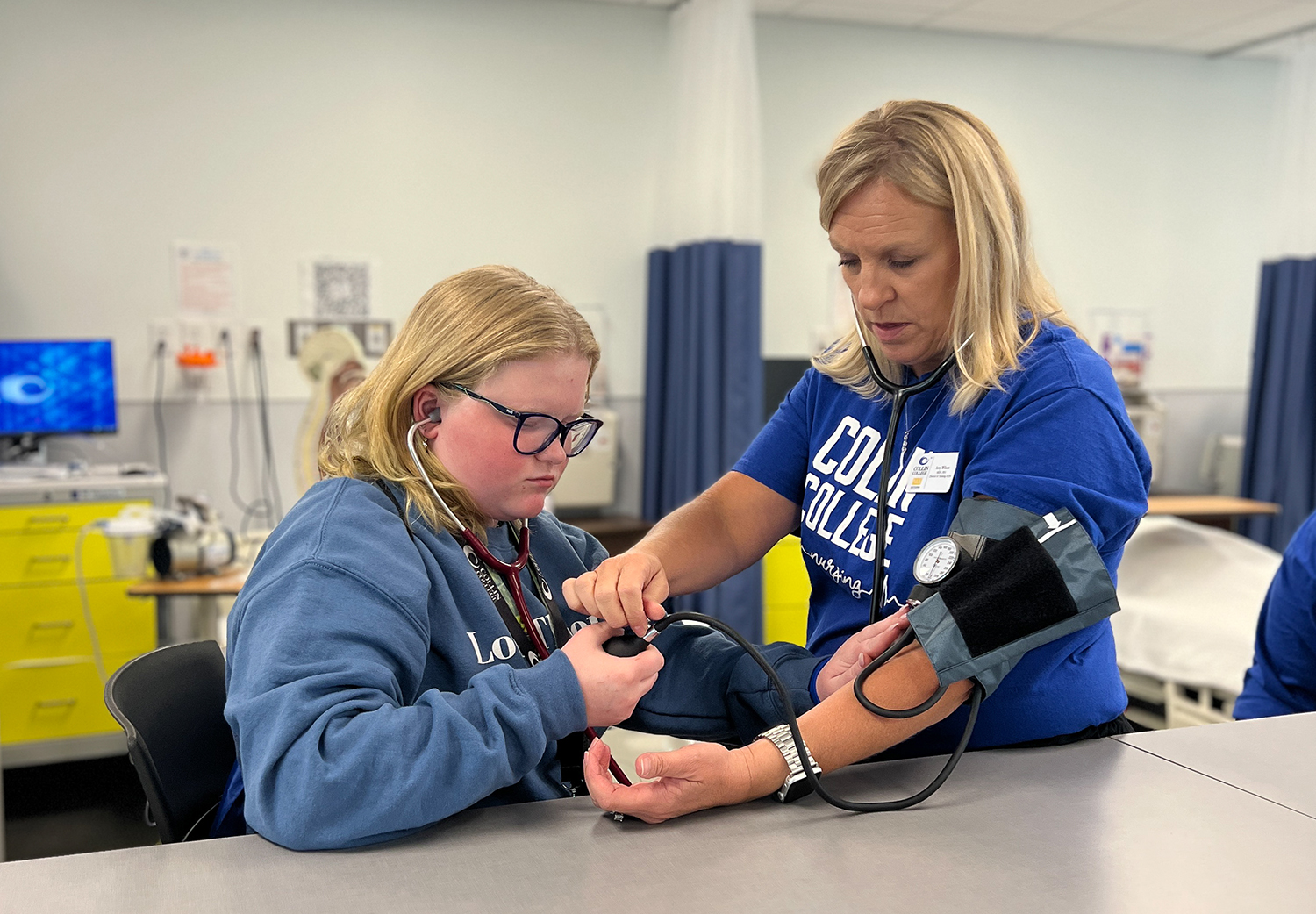 Student Learning to take blood pressure